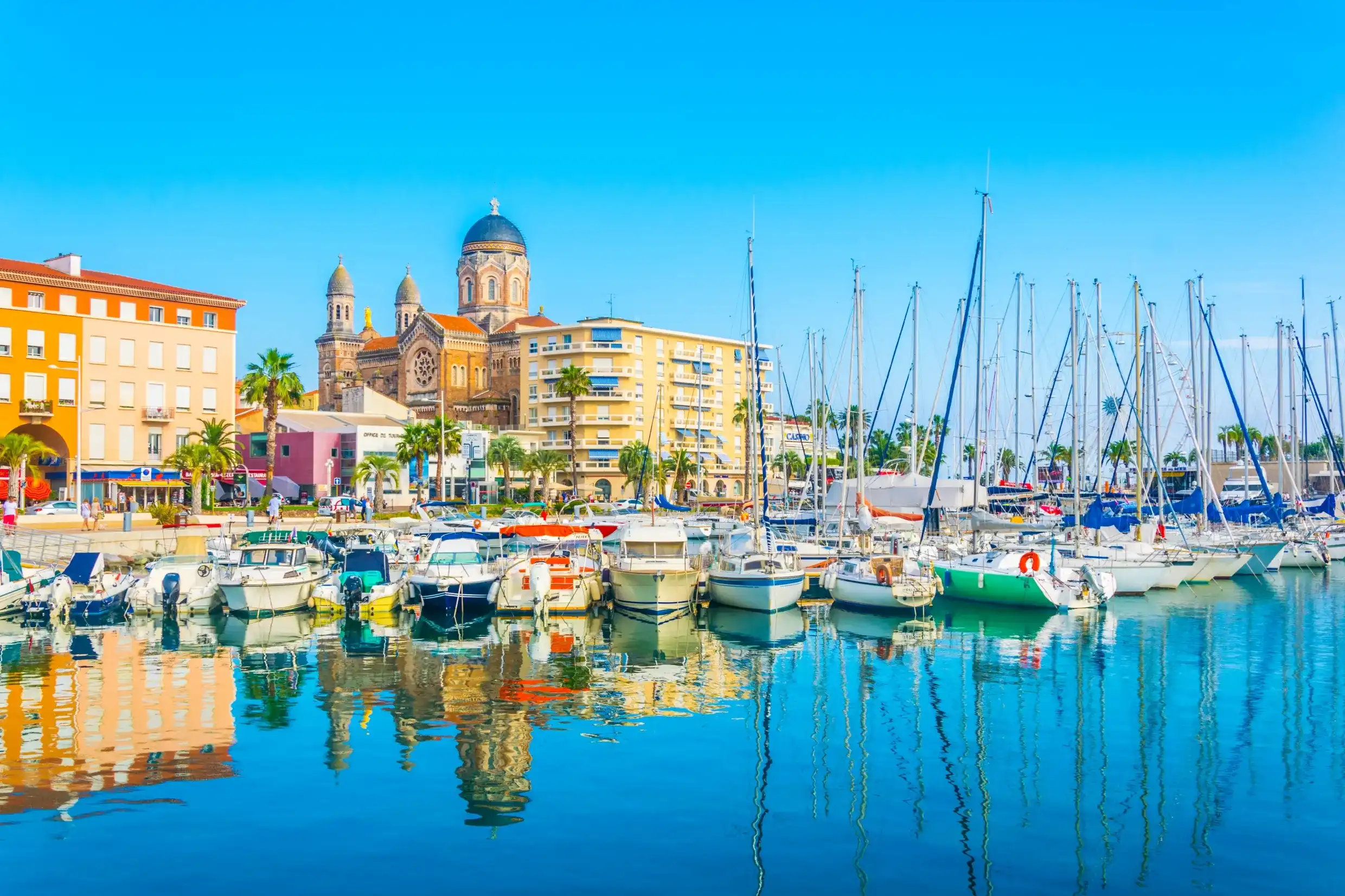 Marina in Saint Raphael dominated by church of our lady of the victory Marina in Saint Raphael dominated by church of our lady of the victory