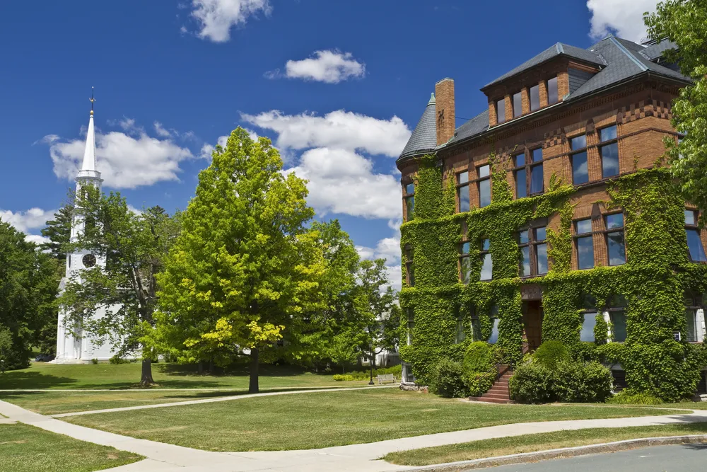Hopkins Hall and First Congregational Church at Williams College in Williamstown, Massahusetts on a beautiful summer's day.