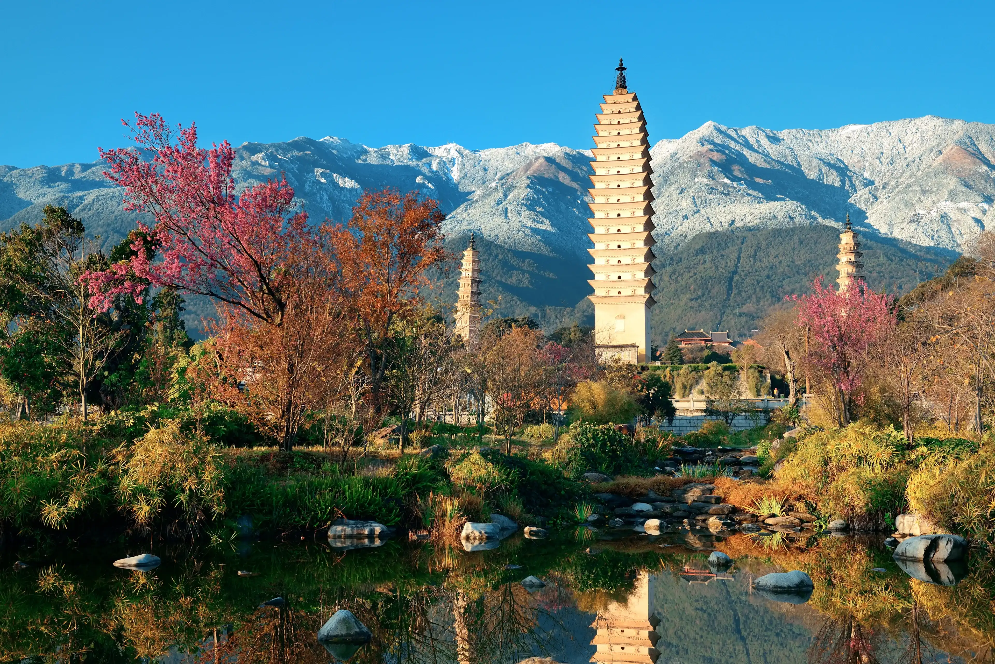 Ancient pagoda in Dali old town with snow capped Mt Cangshan, Yunnan, China. Ancient pagoda in Dali old town with snow capped Mt Cangshan, Yunnan, China.