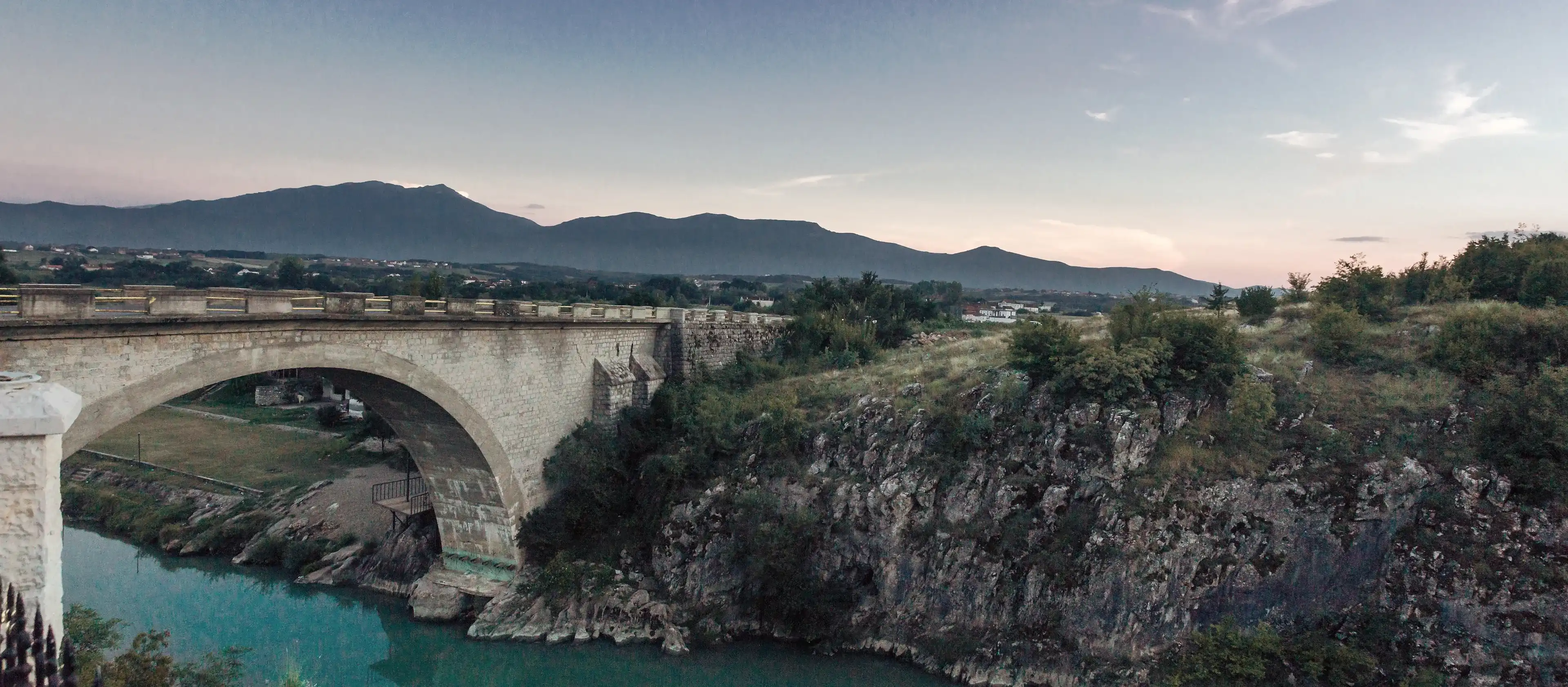 Panoramic view of the ancient holy bridge in Gjakovs, Kosovo in the evening atmoshpere