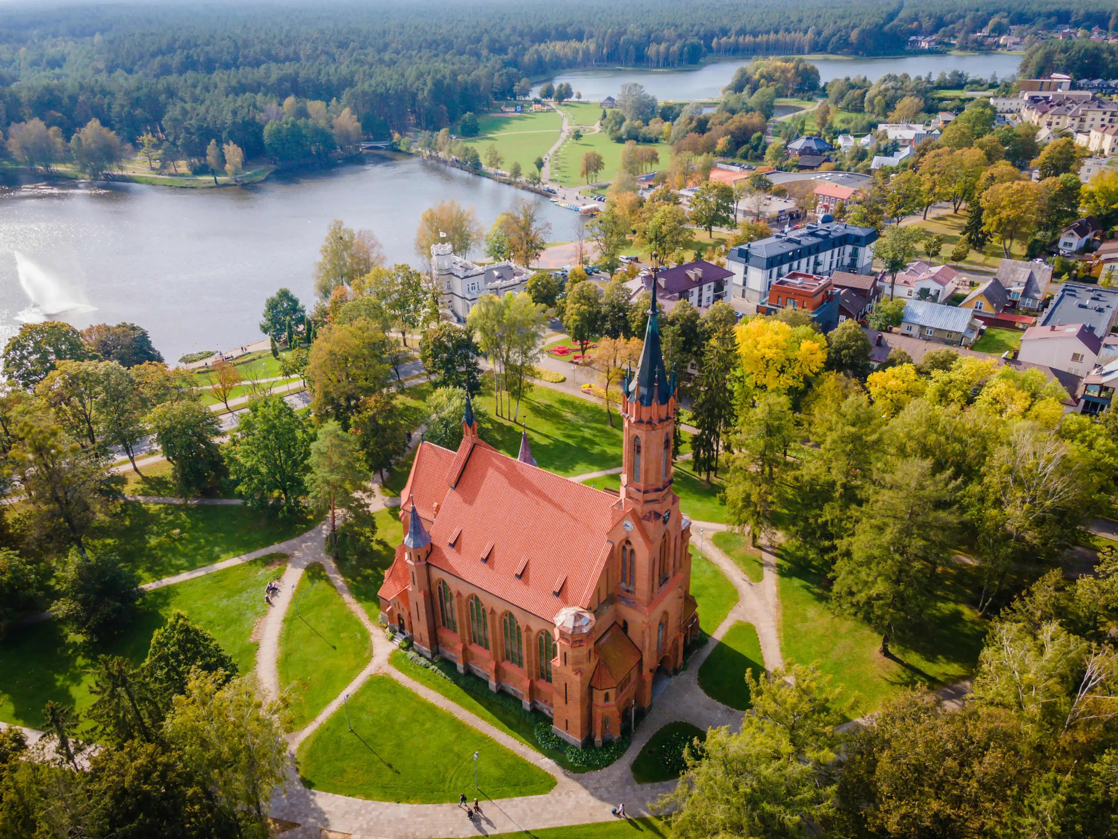 Aerial panoramic view of Lithuanian resort Druskininkai church in city park Aerial panoramic view of Lithuanian resort Druskininkai church in city park