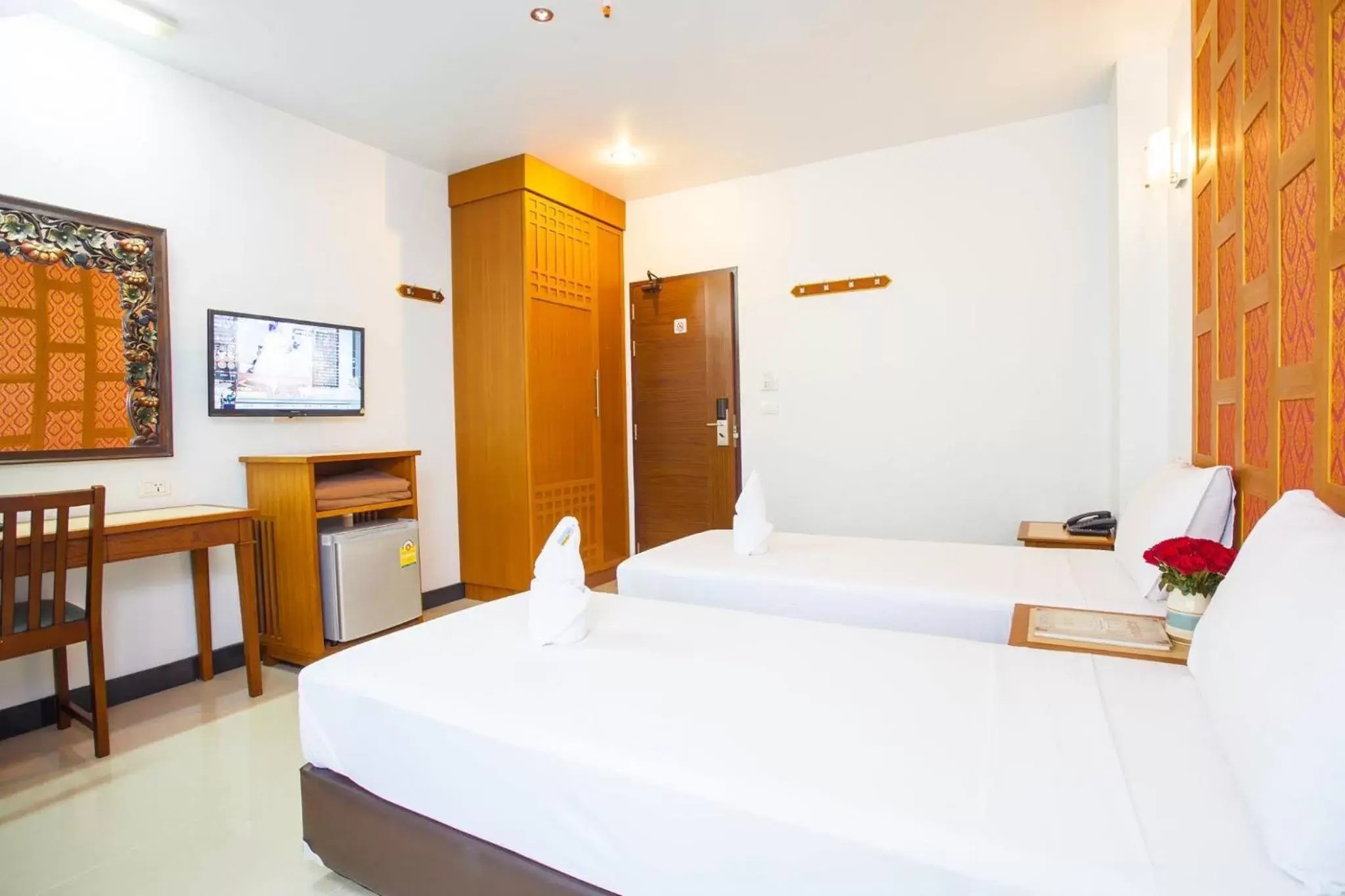 Bed in New Siam Palace Ville Hotel - SHA Extra Plus Certified