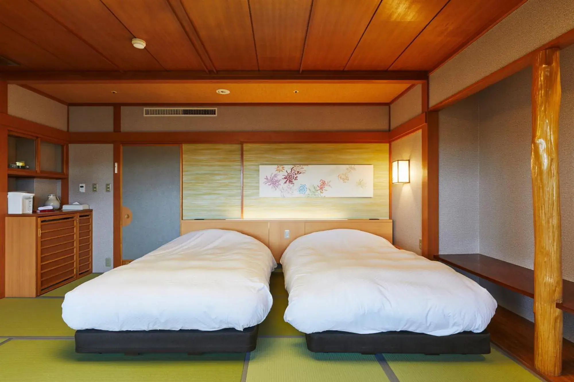 Bed in Takinoyu Hotel