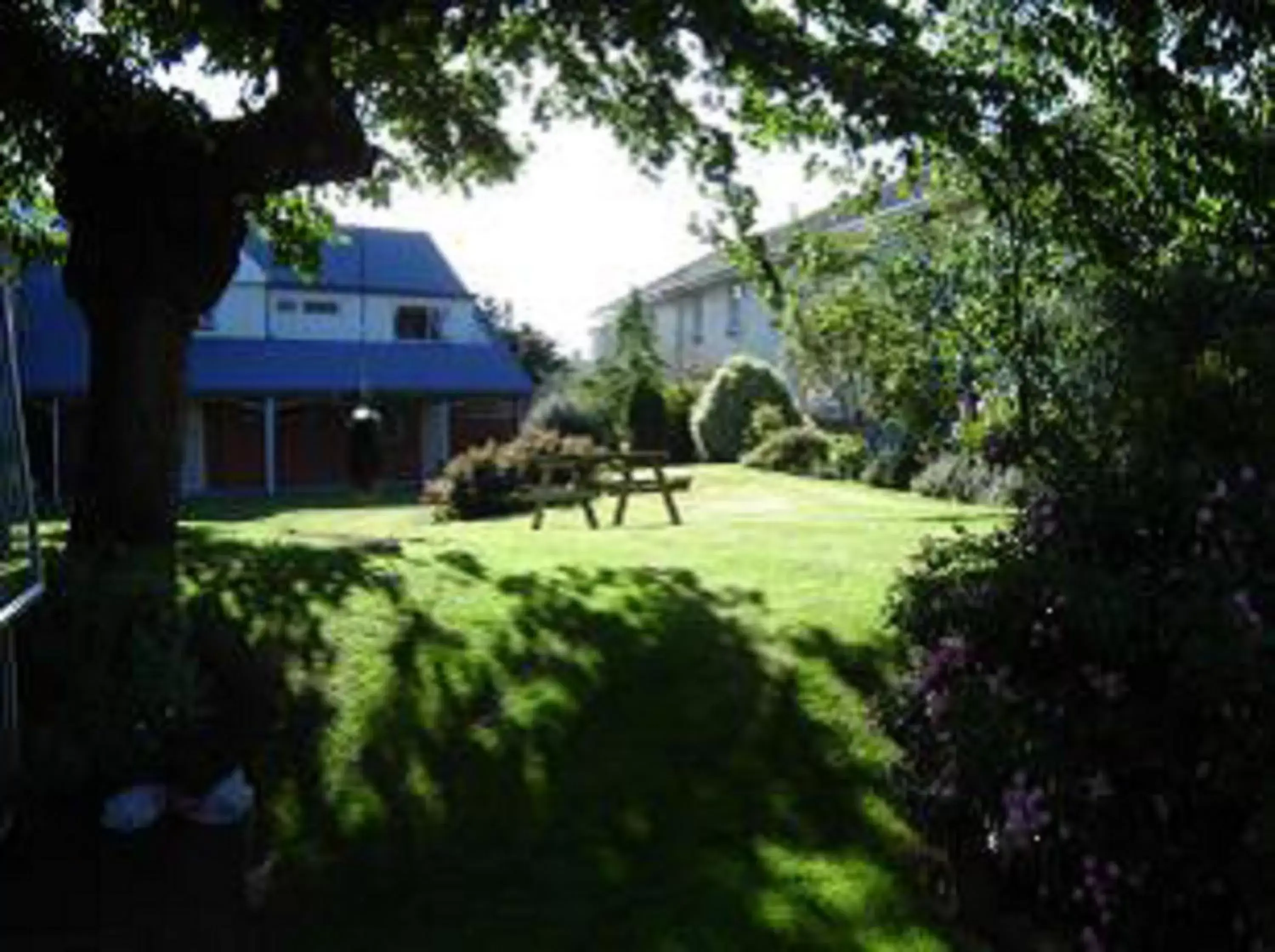 Garden, Property Building in Homestead Villa Motel