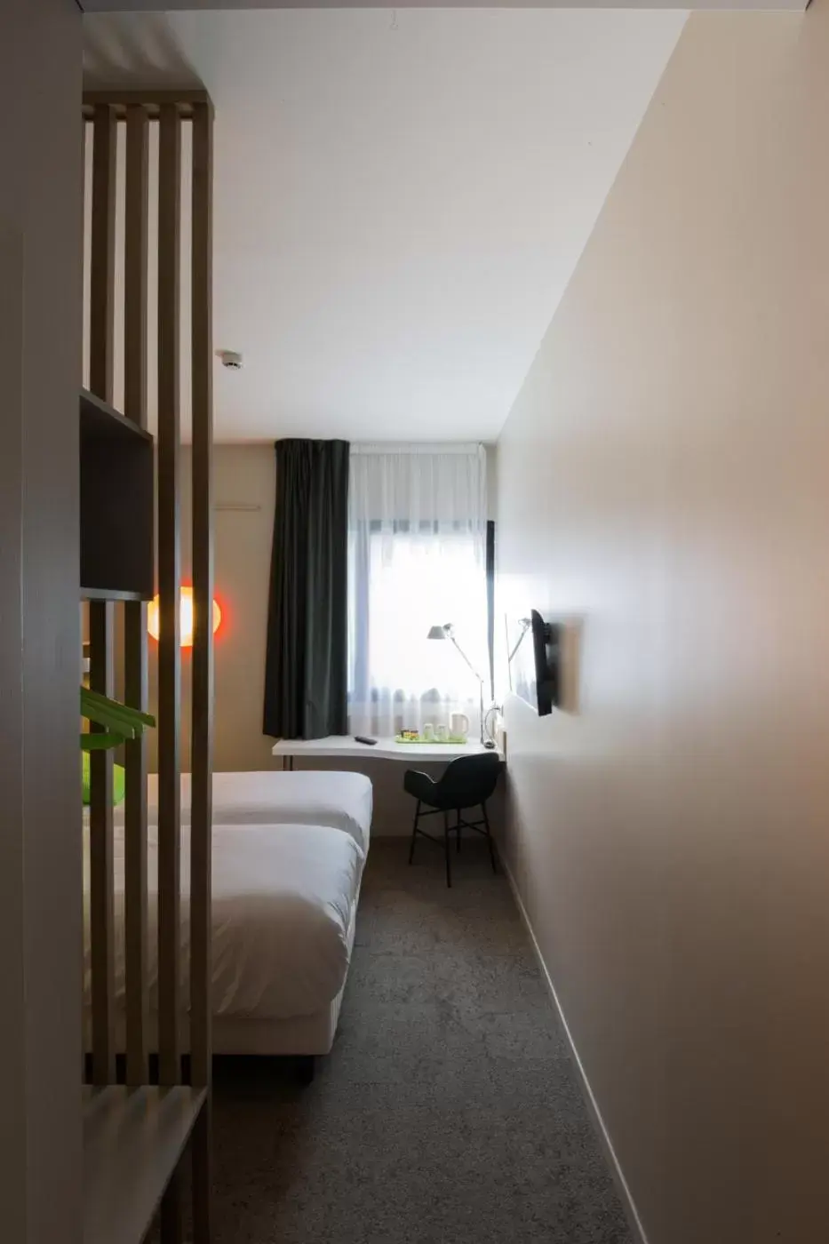 Bedroom in Campanile Rennes Centre - Gare