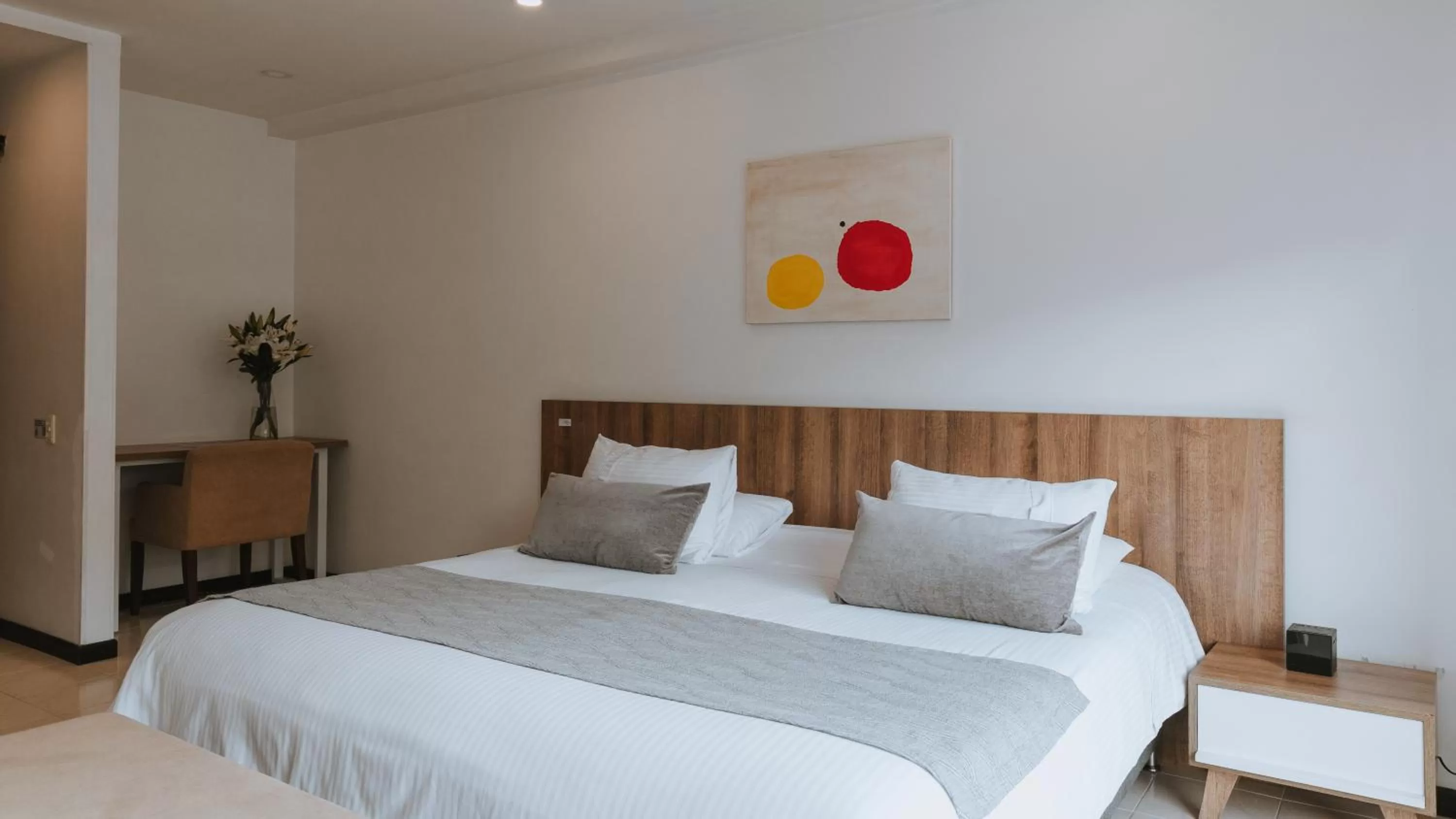 Bedroom, Bed in Travelers Orange Suites