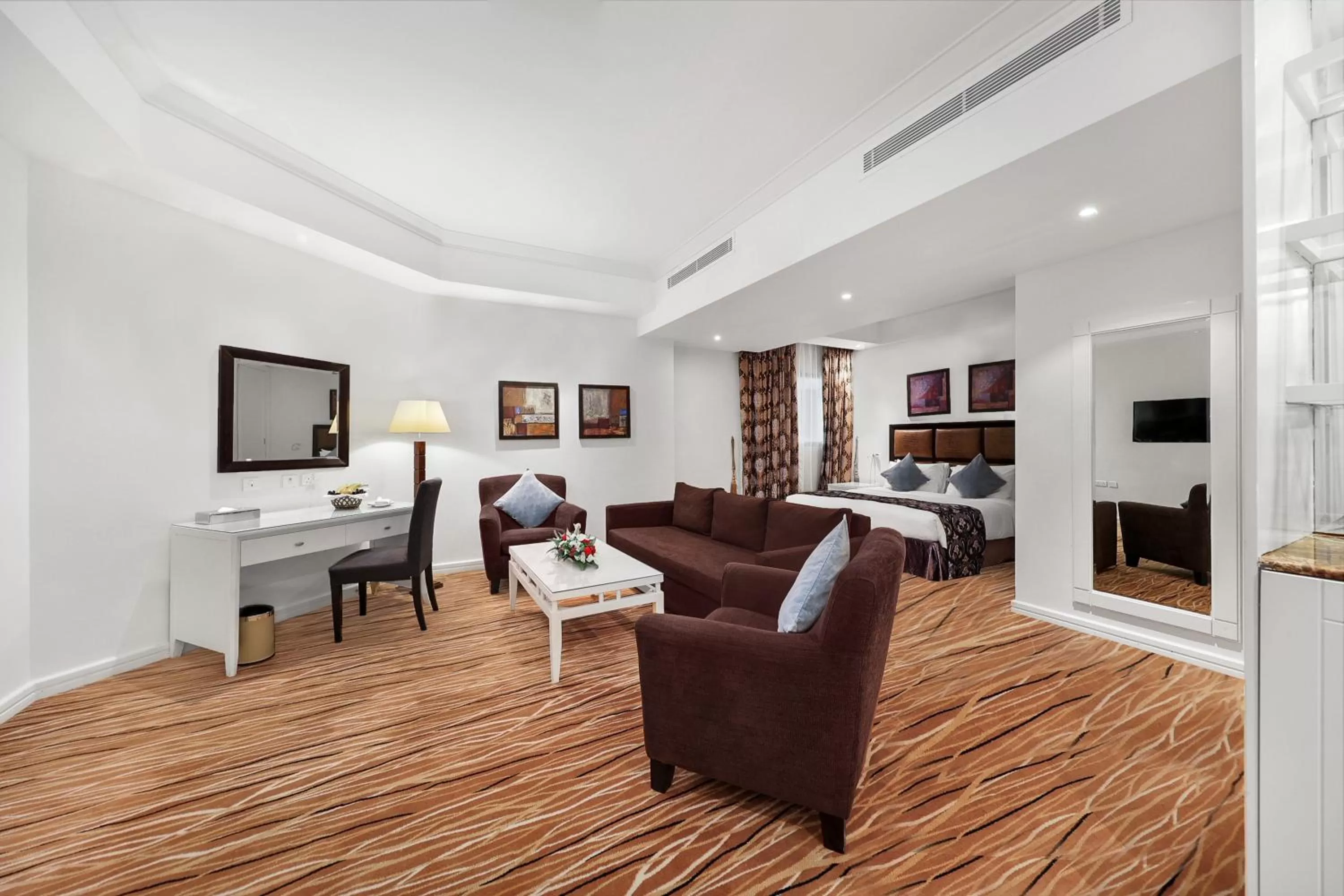 Bed, Seating Area in Plaza Inn Doha