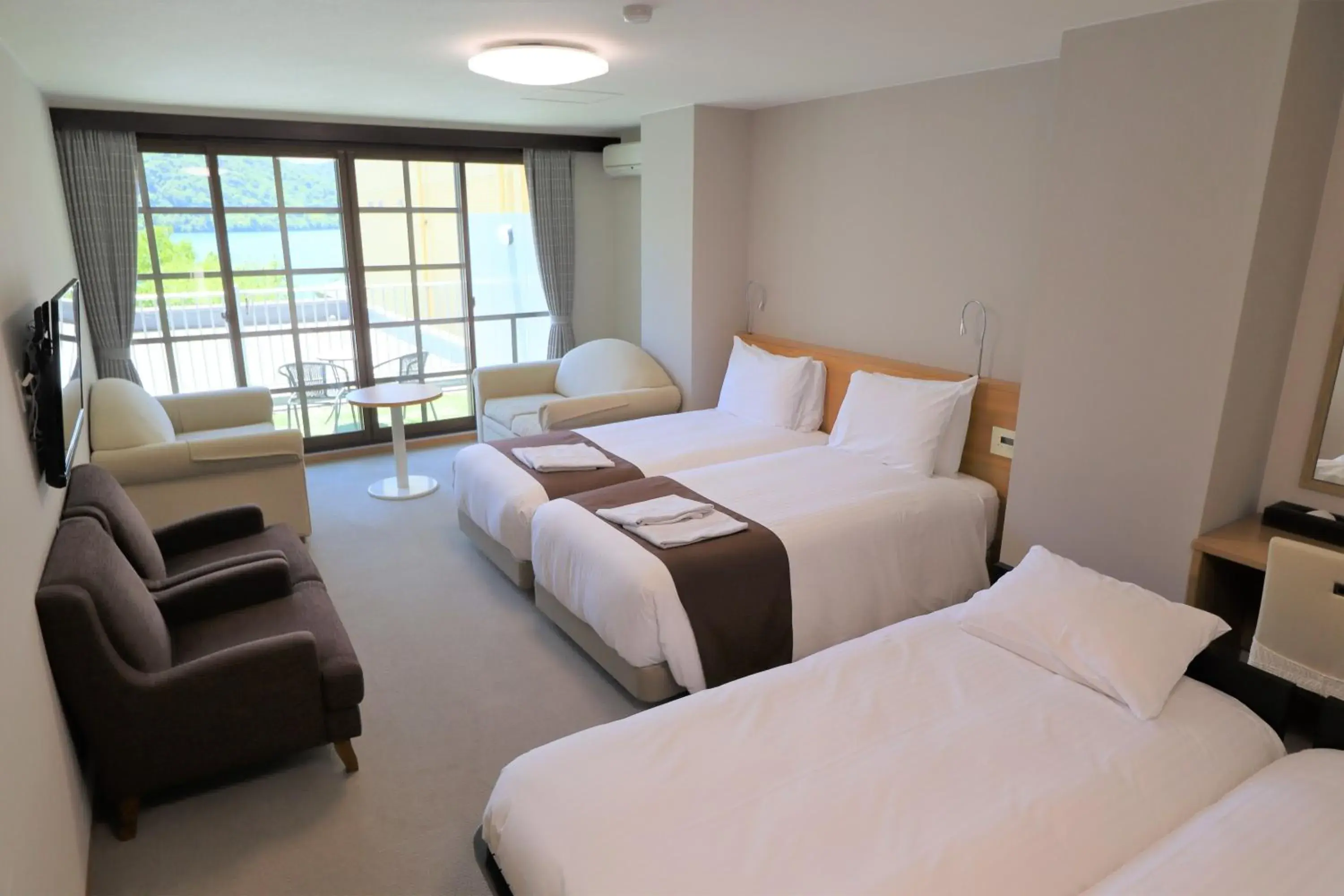 Bed in Hatago Nagomi Hot Spring Hotel