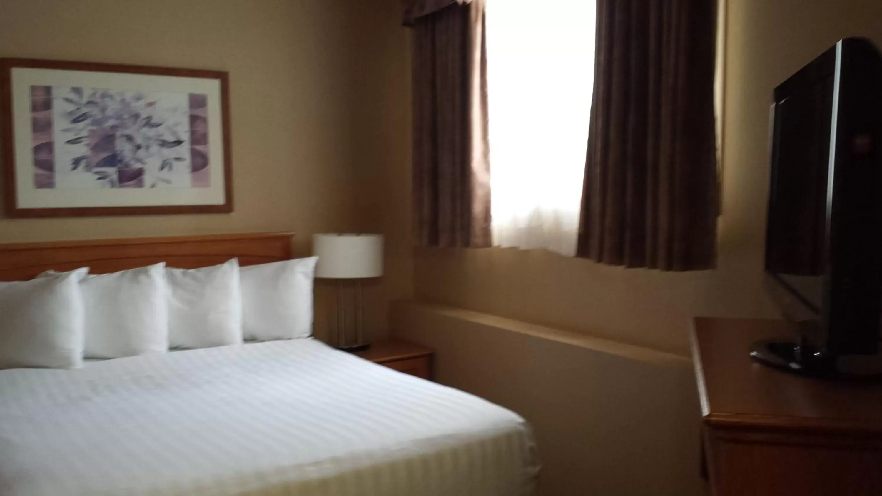 Bed in Days Inn & Suites by Wyndham West Edmonton