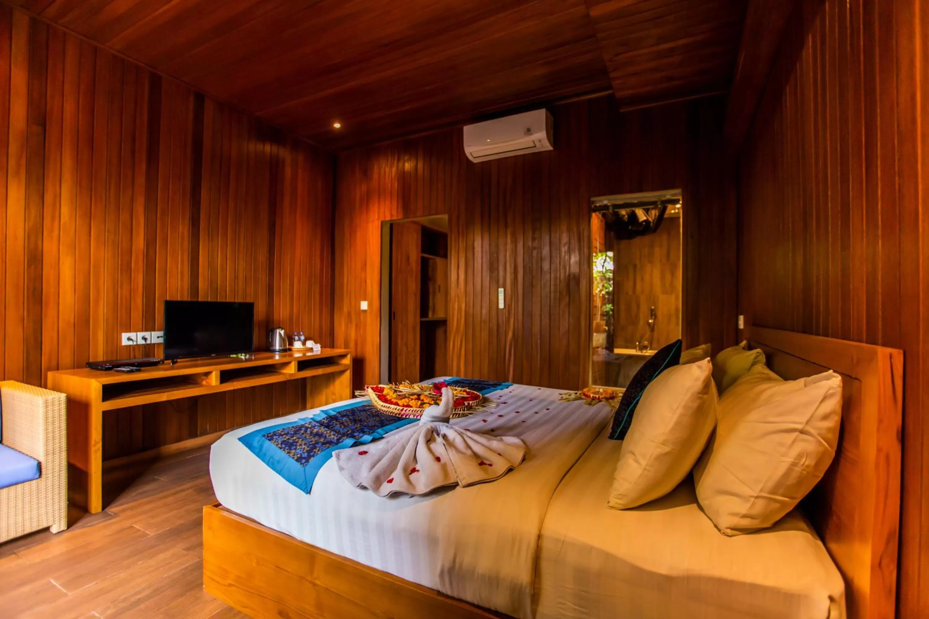 Bed in Seken Cottages Ubud