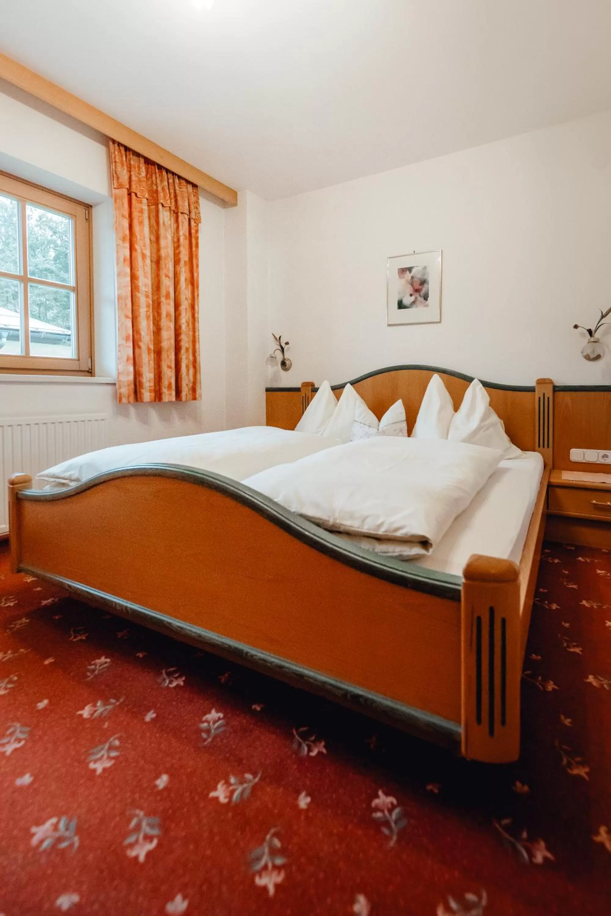 Bed in Zimmer & Ferienwohnungen Dandler