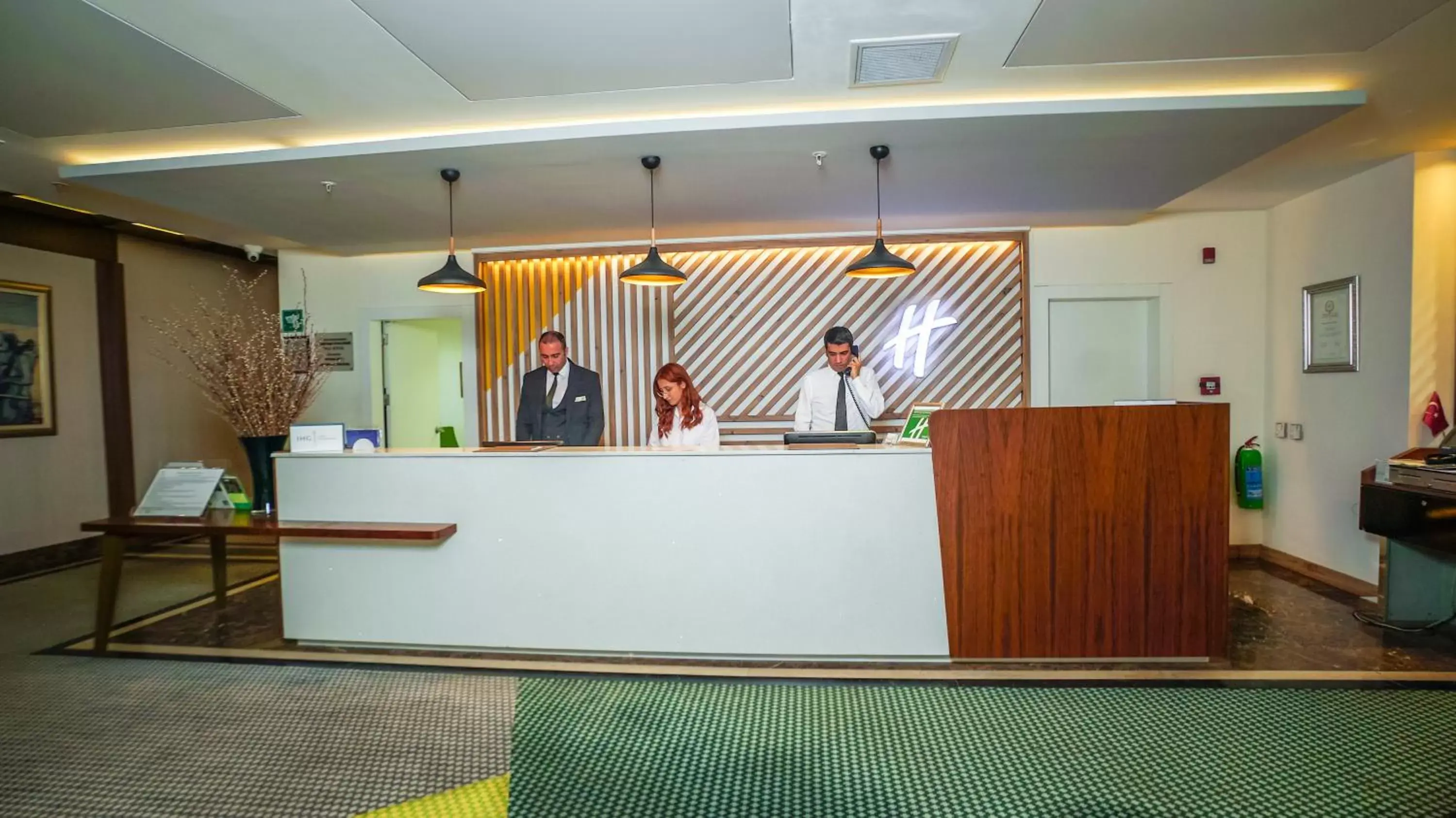 Lobby or reception in Holiday Inn Ankara-Kavaklidere by IHG Lobby or reception in Holiday Inn Ankara-Kavaklidere by IHG