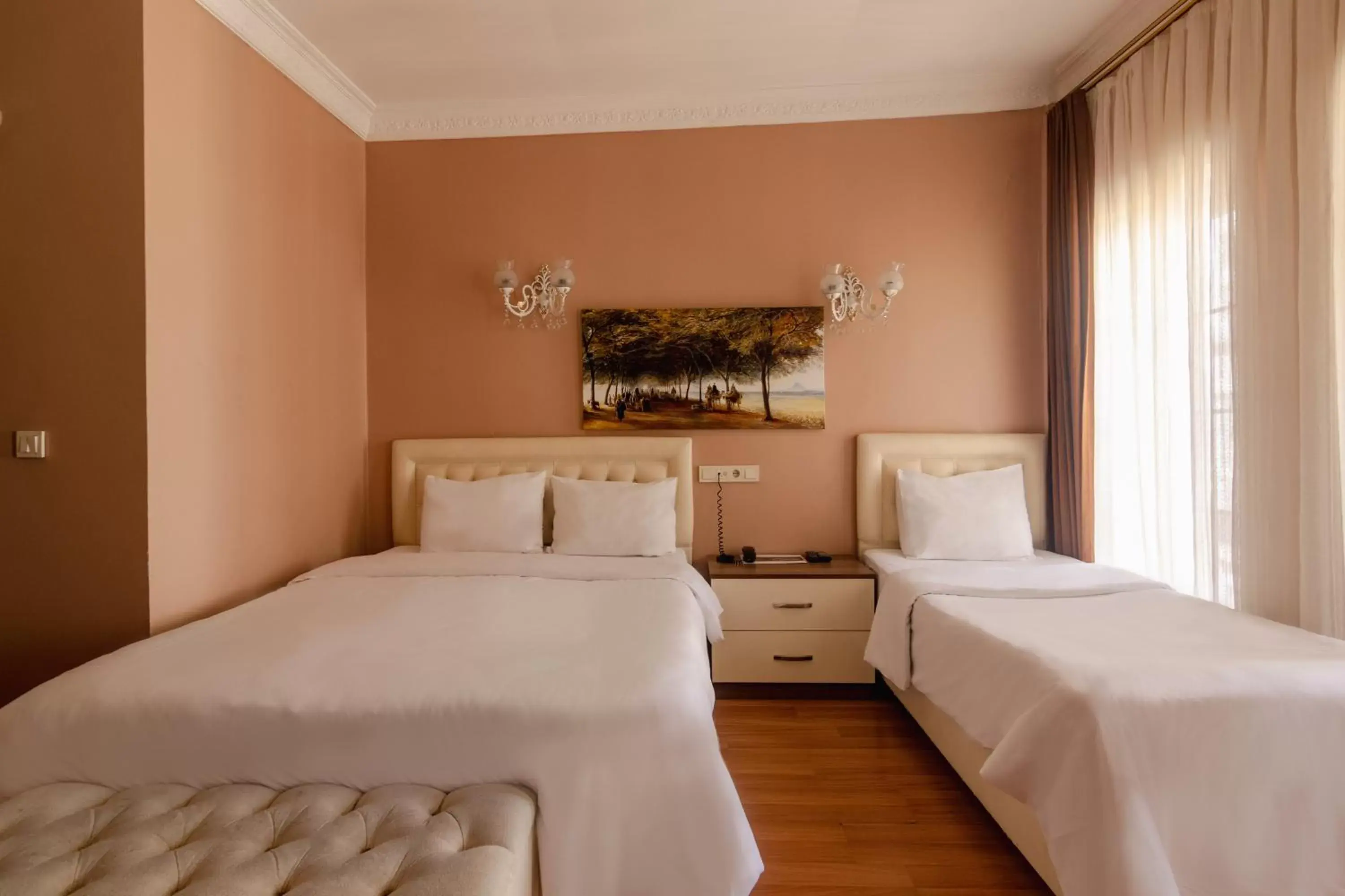 Bed in Zendy Suite Hotel
