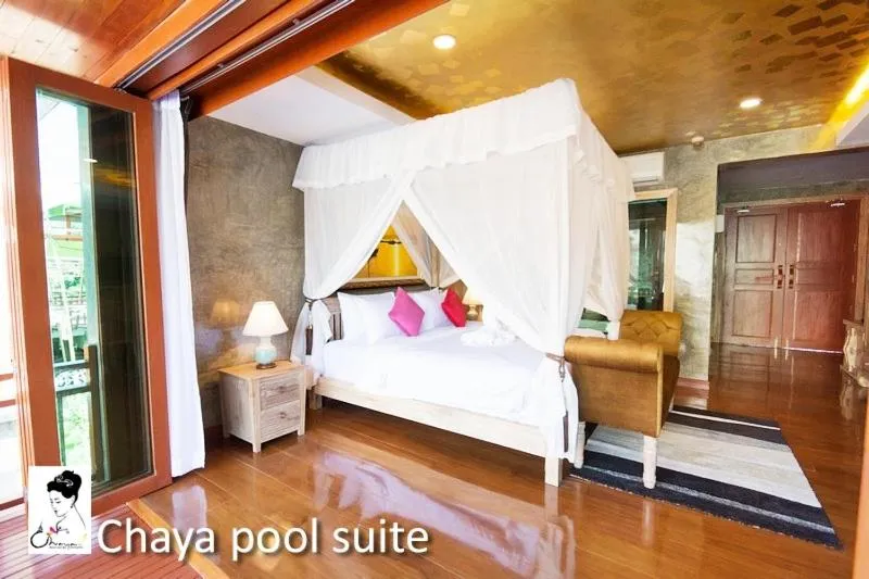 Bed in The Chaya Resort and Spa