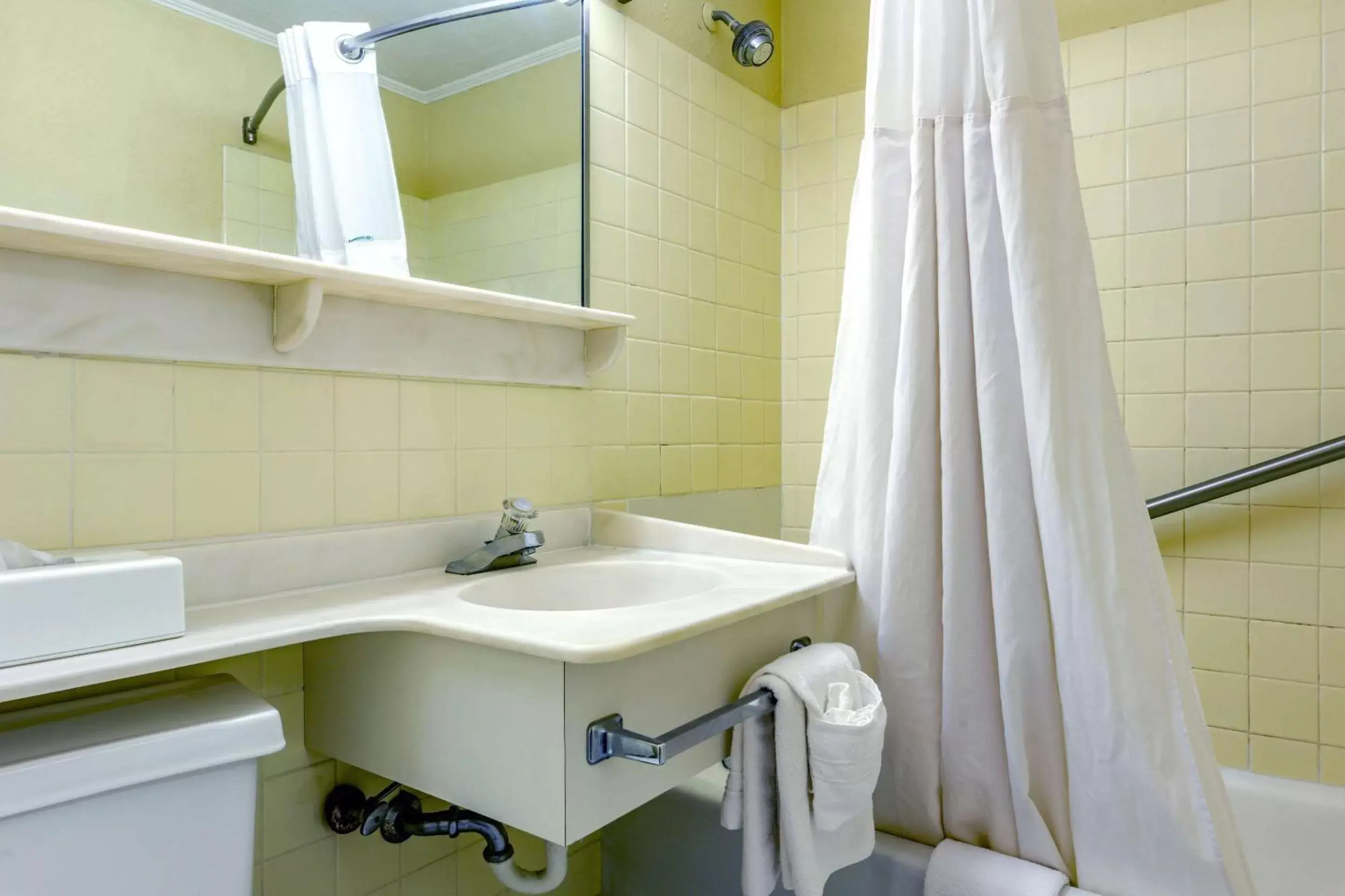 Bathroom in Days Inn & Suites by Wyndham Lebanon PA