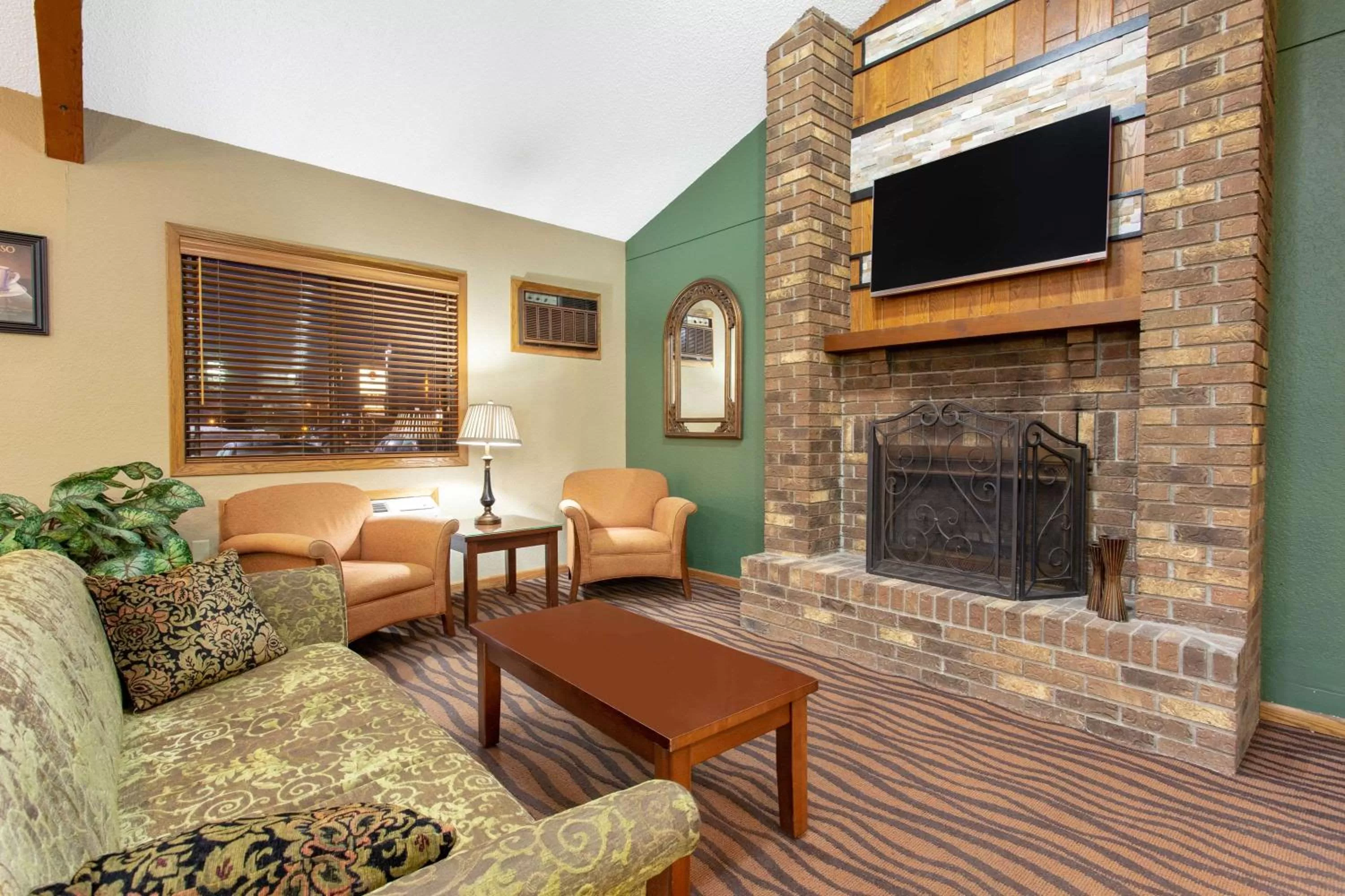 Lobby or reception in AmericInn by Wyndham West Bend