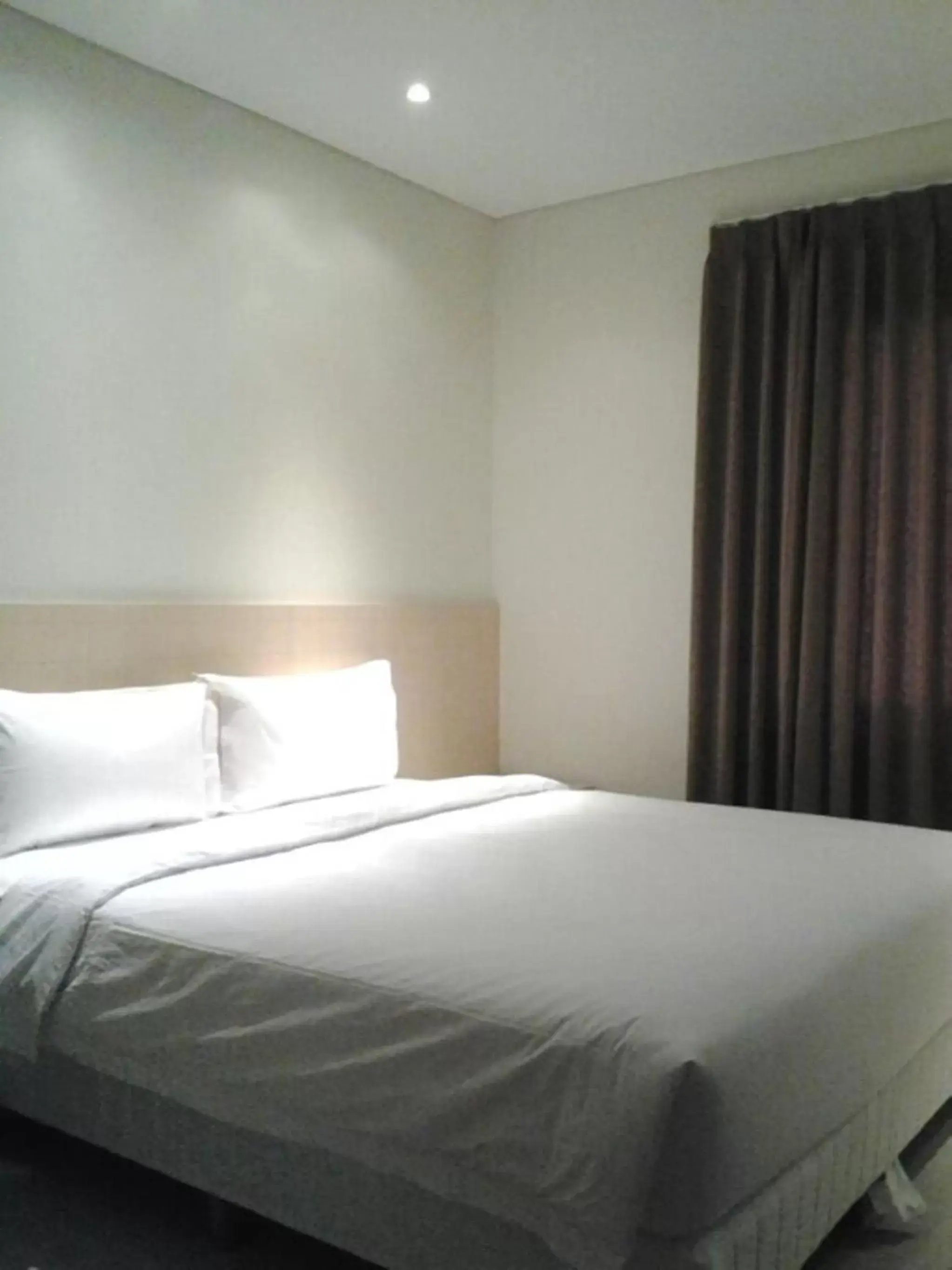 Bed in Zodiak Asia Afrika by KAGUM Hotels