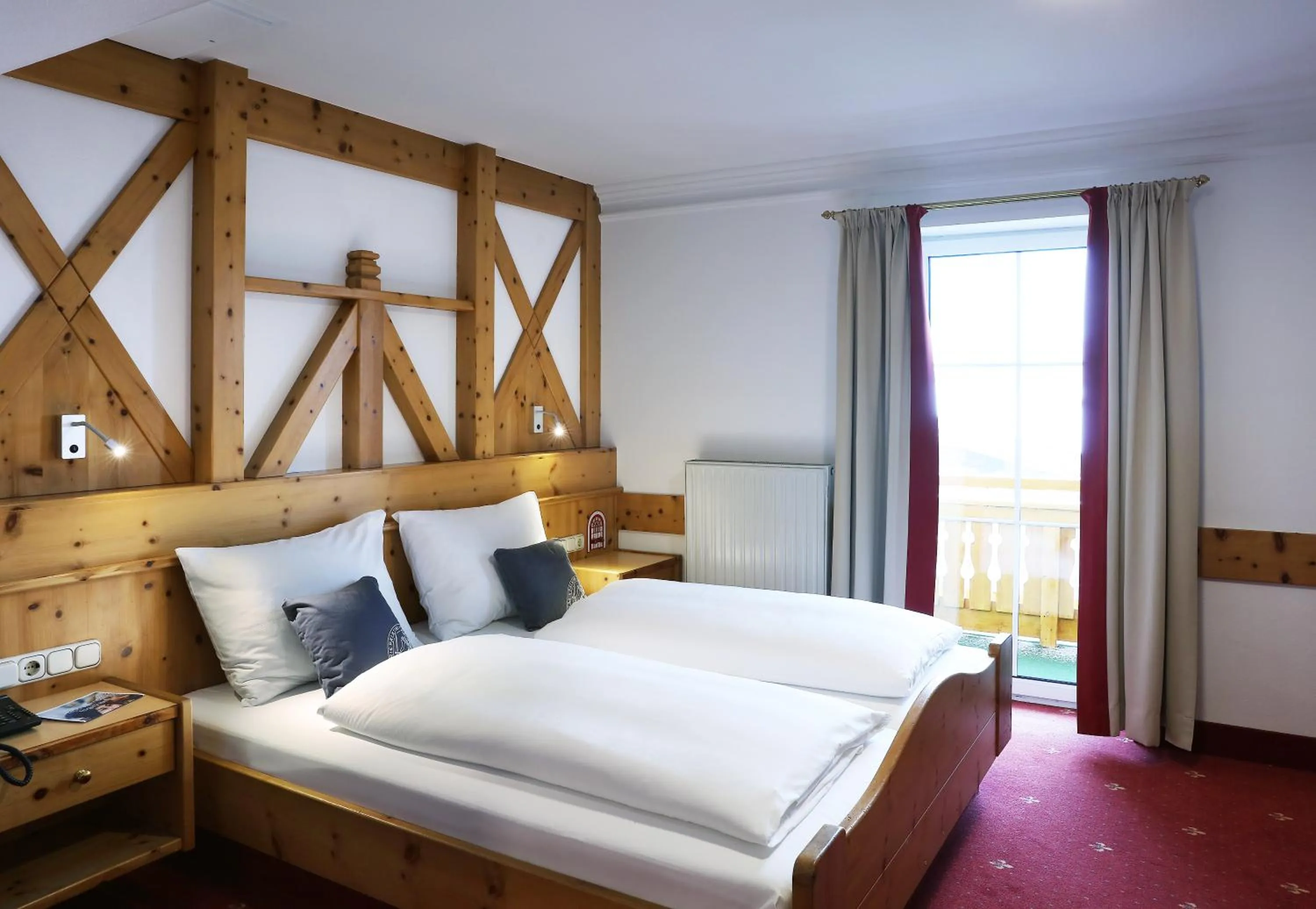Photo of the whole room, Bed in JUFA Alpenhotel Saalbach