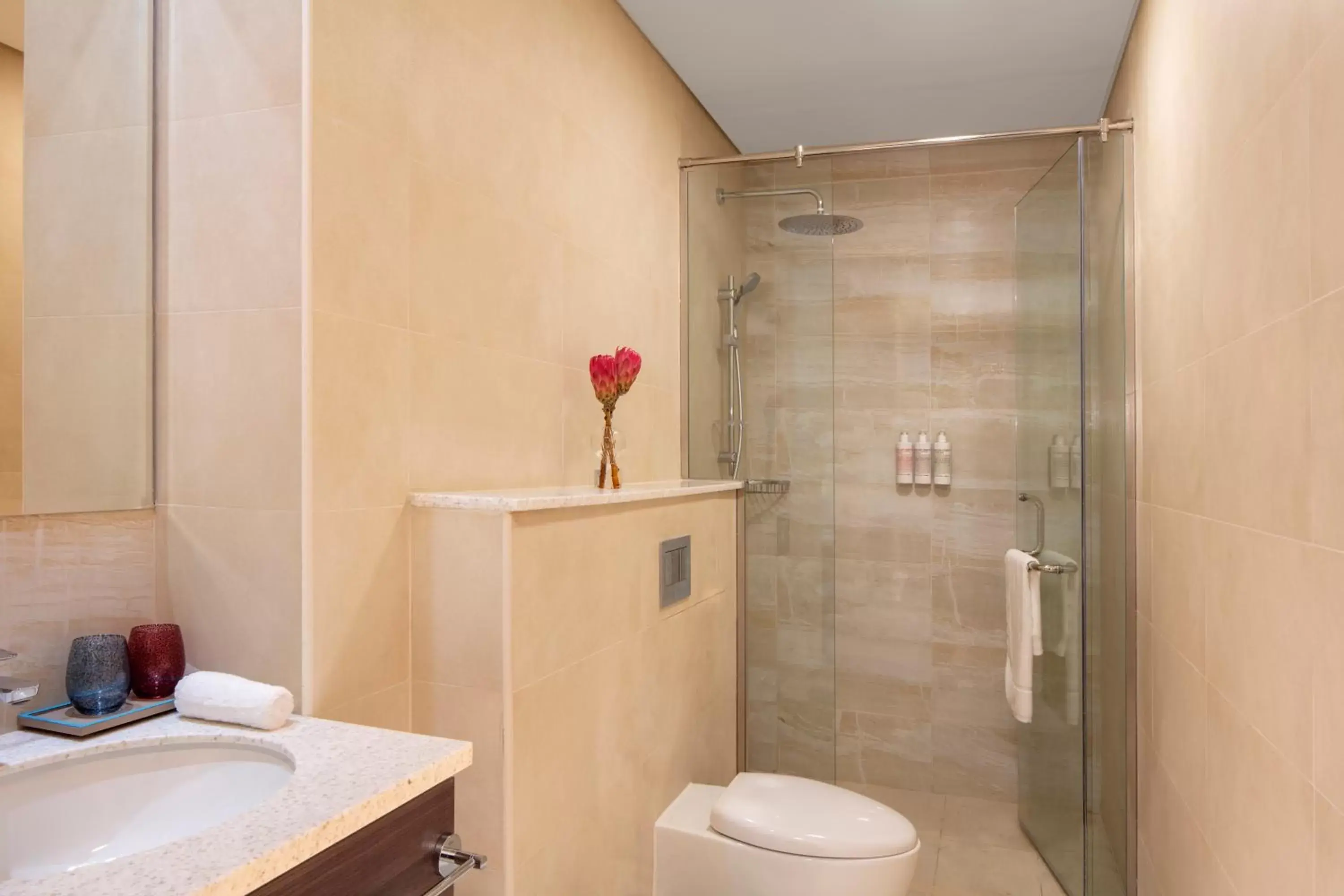 Bathroom in Avani Plus Palm View Dubai Hotel & Suites