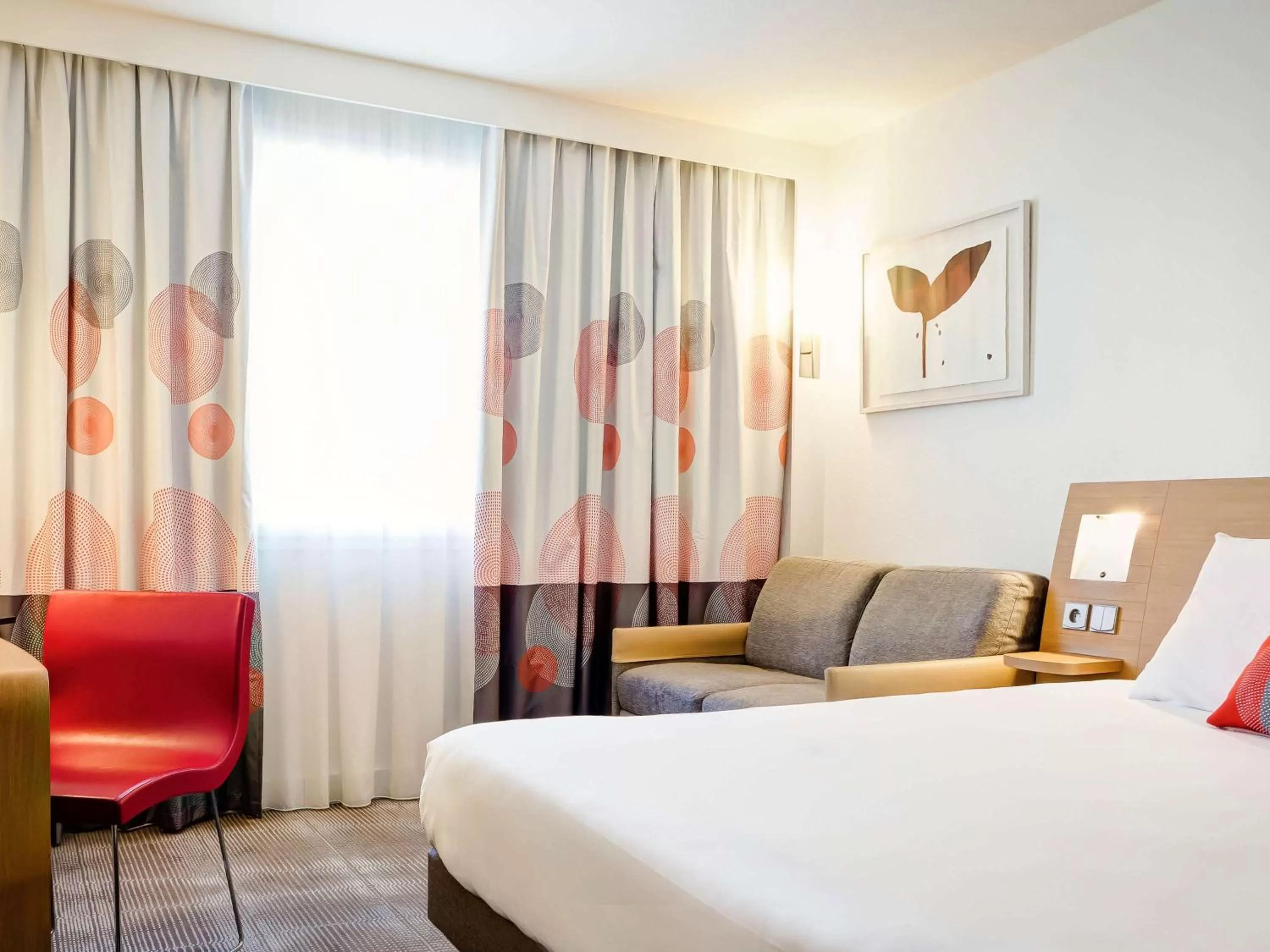 Photo of the whole room, Bed in Novotel Lyon Gerland Musée des Confluences