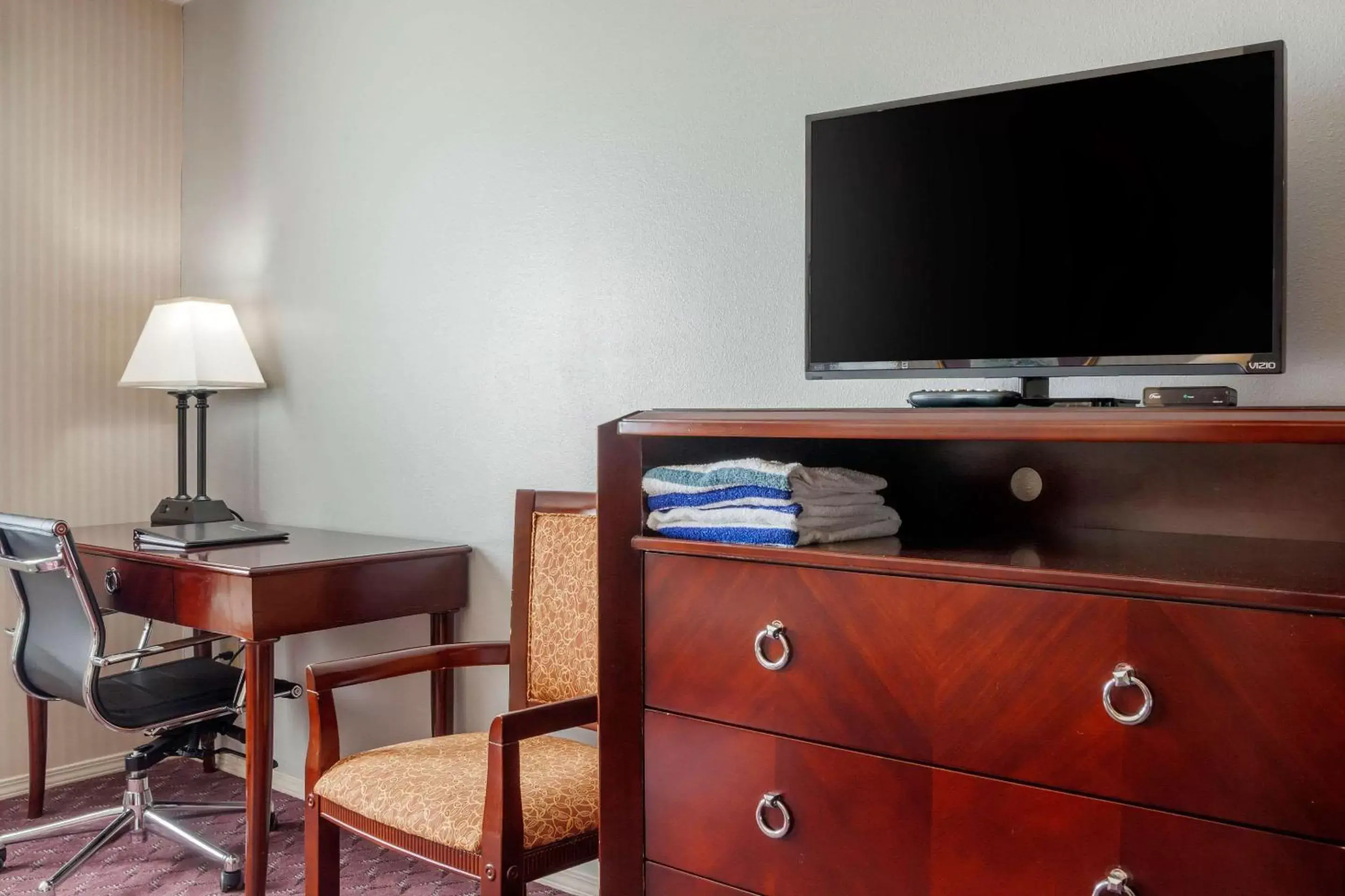 Photo of the whole room, TV/Entertainment Center in Clarion Hotel & Suites