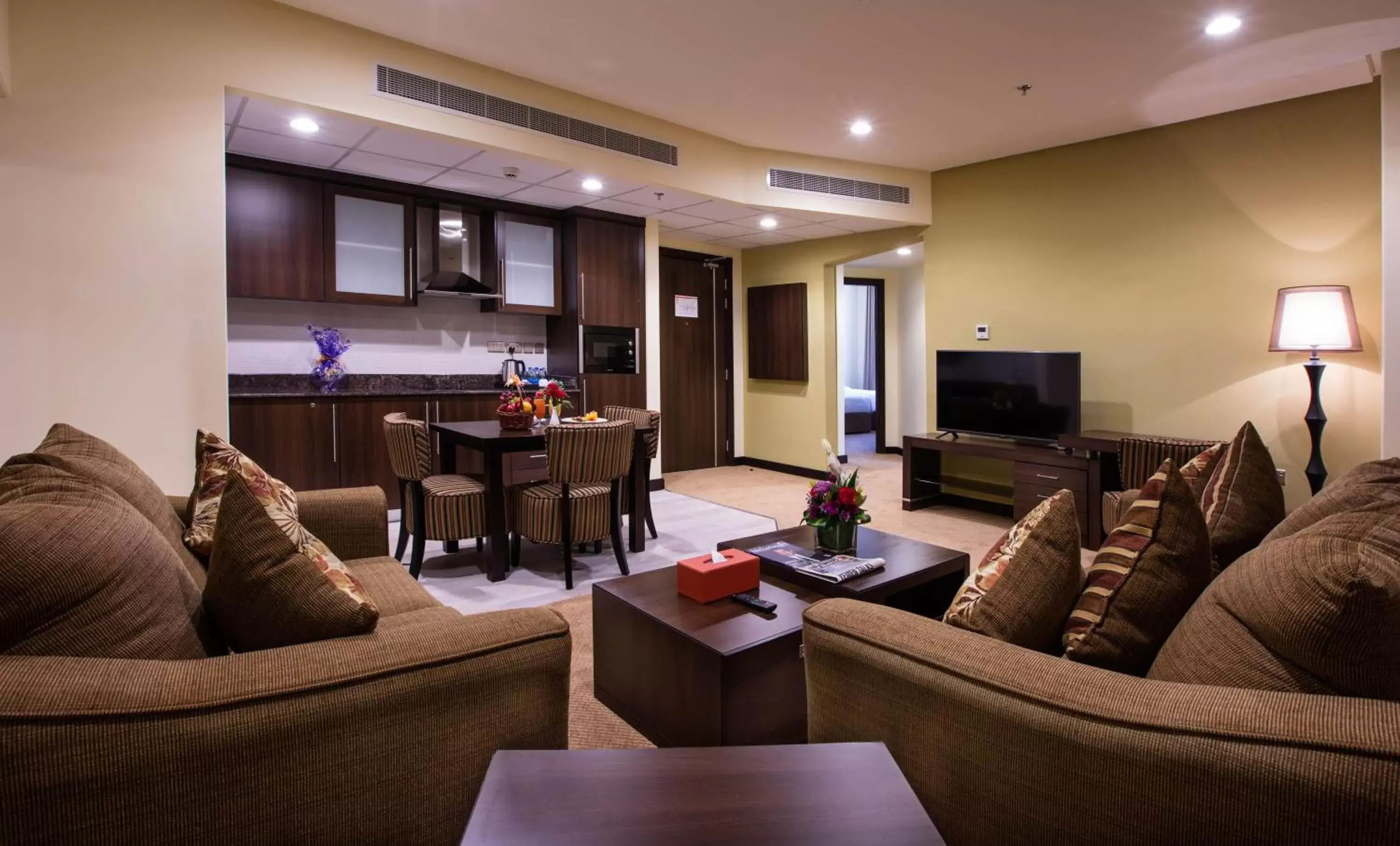 Kitchen or kitchenette, Lounge/Bar in Orange Suites Hotel