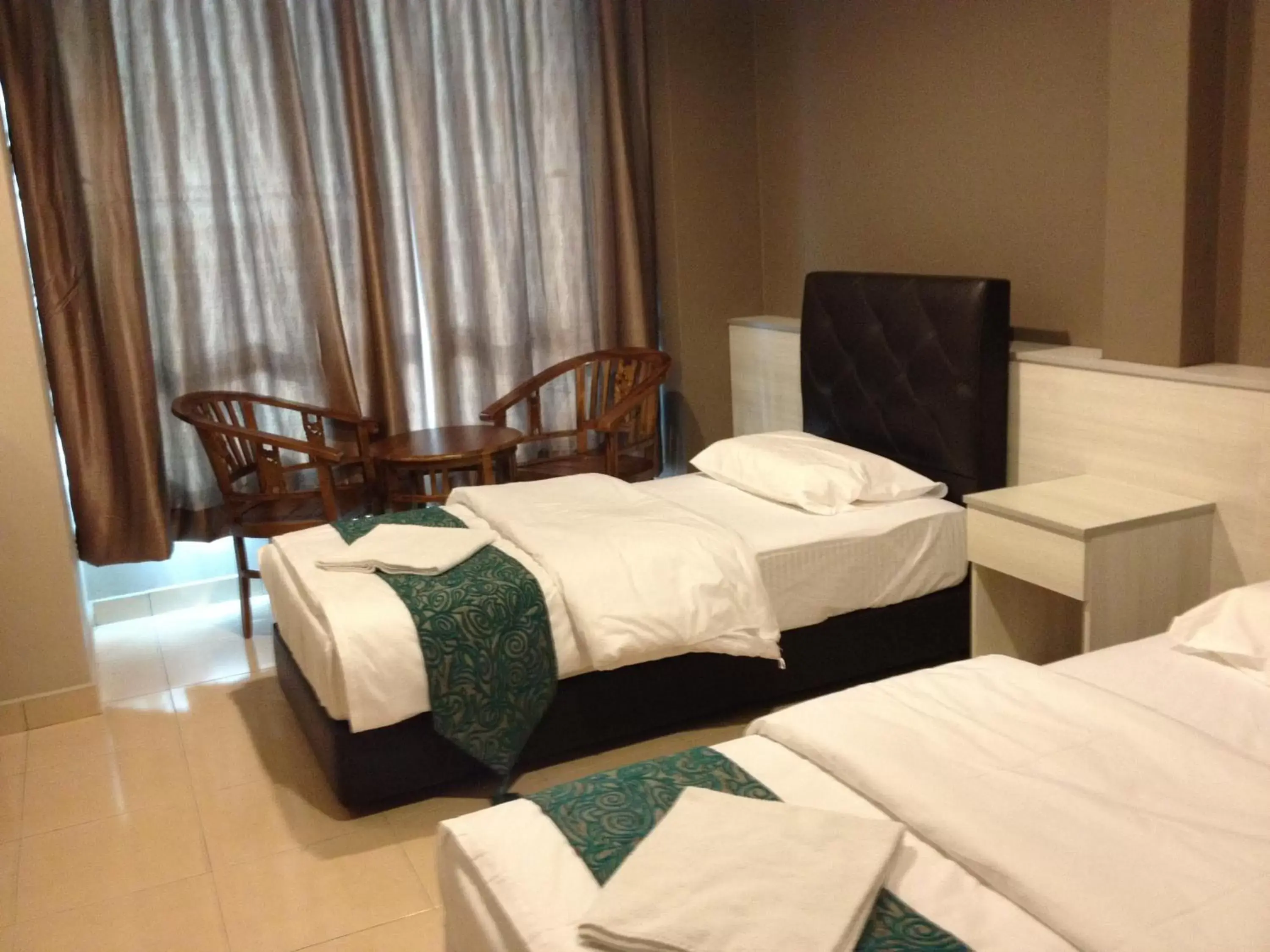 Bed in AERO Star Hotel