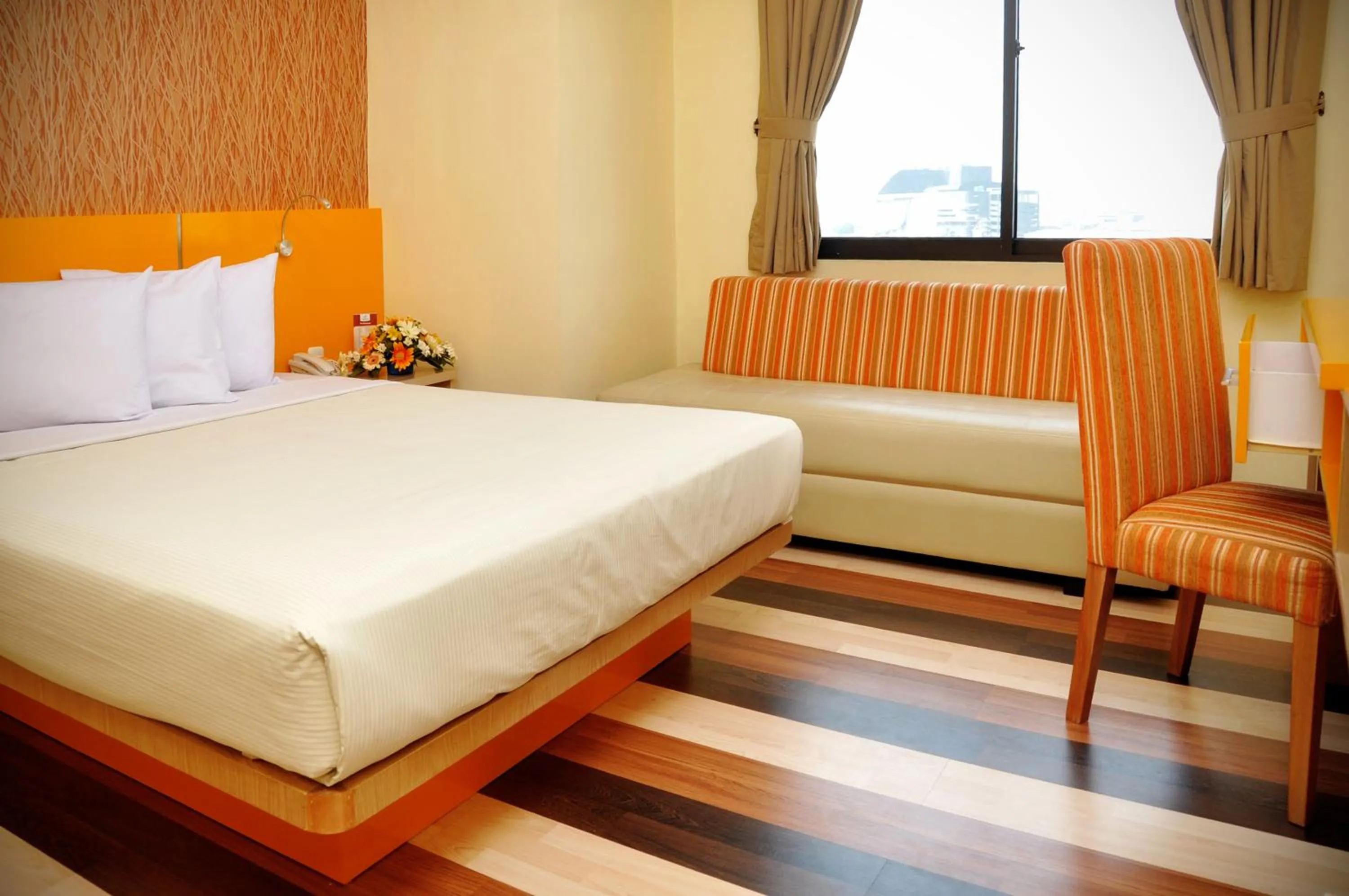 Bed in Pandanaran Hotel
