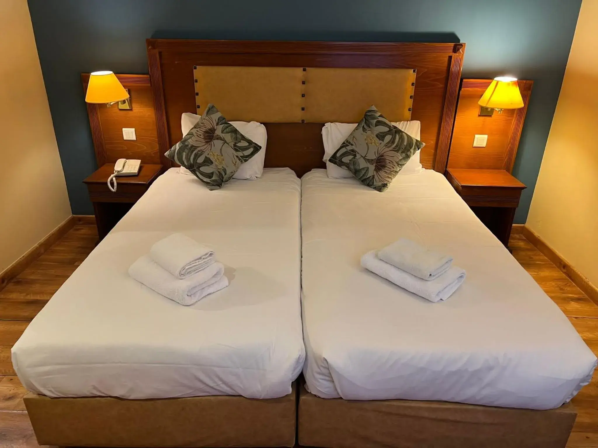 Bed in 121 Paris Hotel