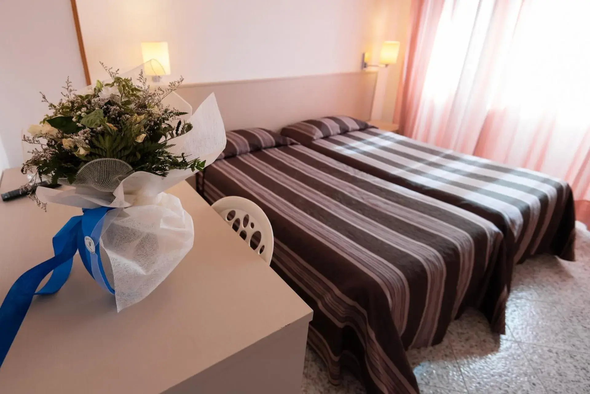 Bed in Hotel il Delfino