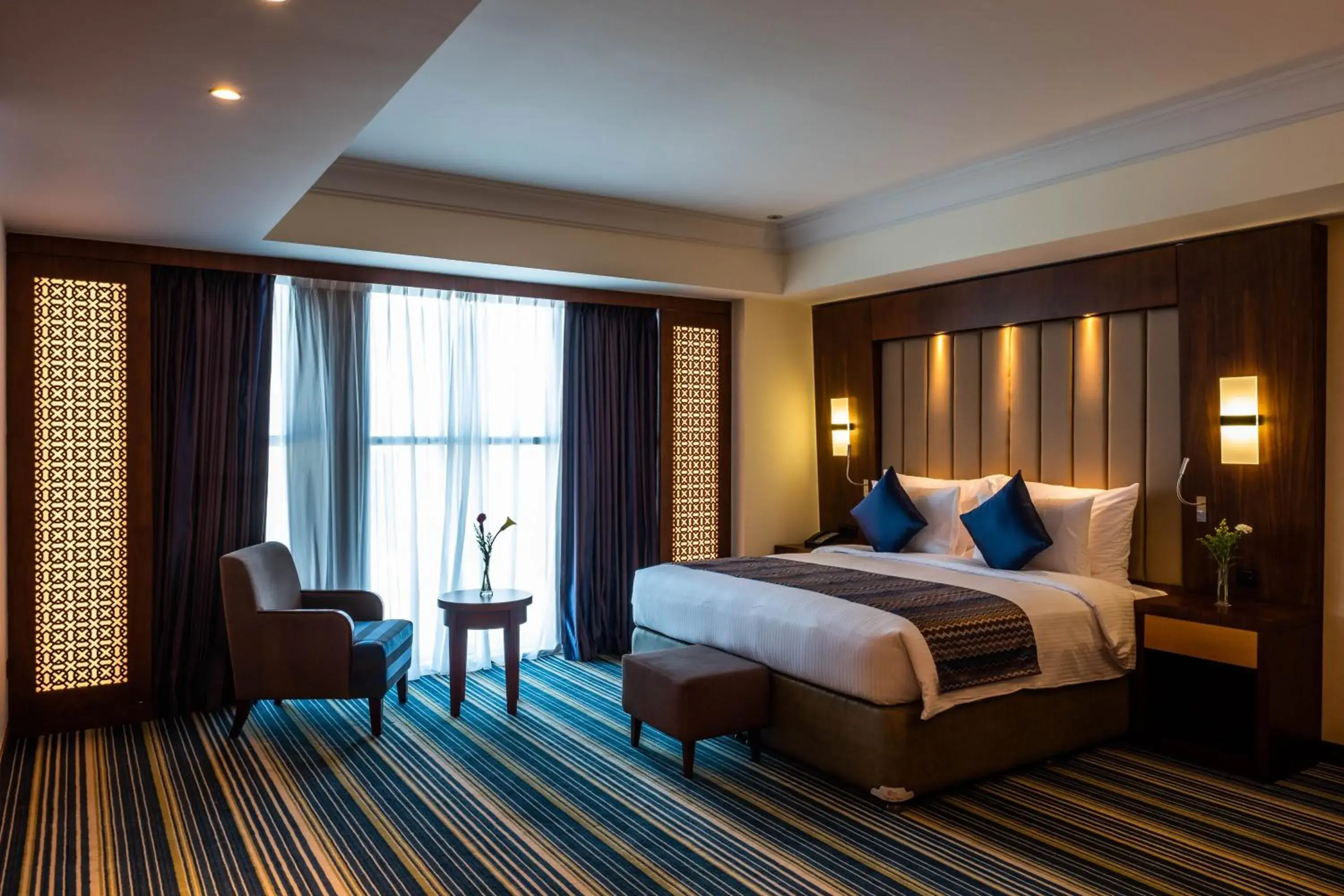 View (from property/room), Bed in Royal Tulip Muscat View (from property/room), Bed in Royal Tulip Muscat