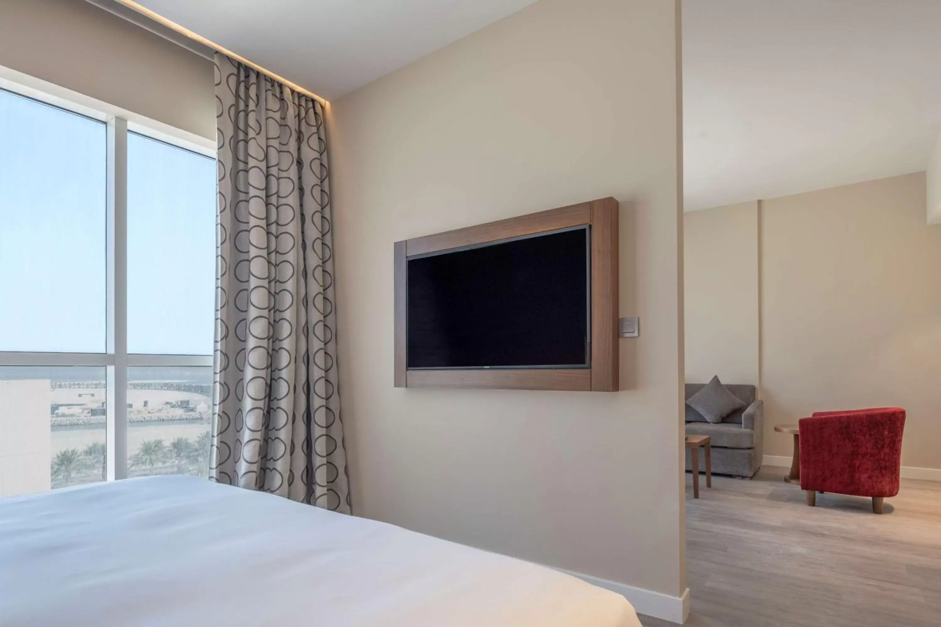 Photo of the whole room, Bed in Radisson Resort Ras Al Khaimah Marjan Island Photo of the whole room, Bed in Radisson Resort Ras Al Khaimah Marjan Island
