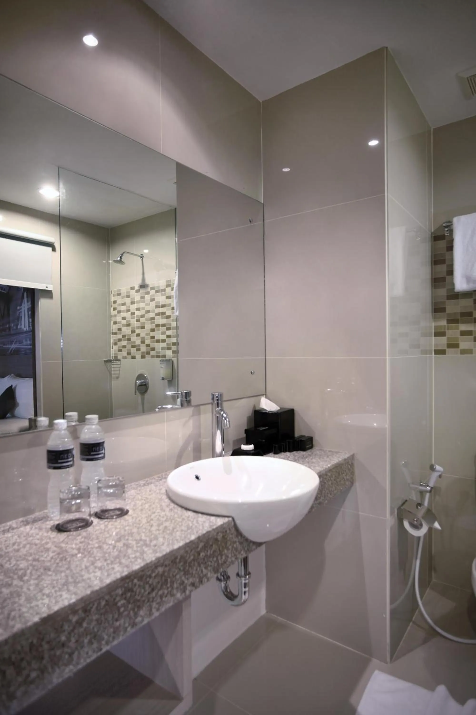 Bathroom in Hotel Neo Candi Simpang Lima - Semarang by ASTON