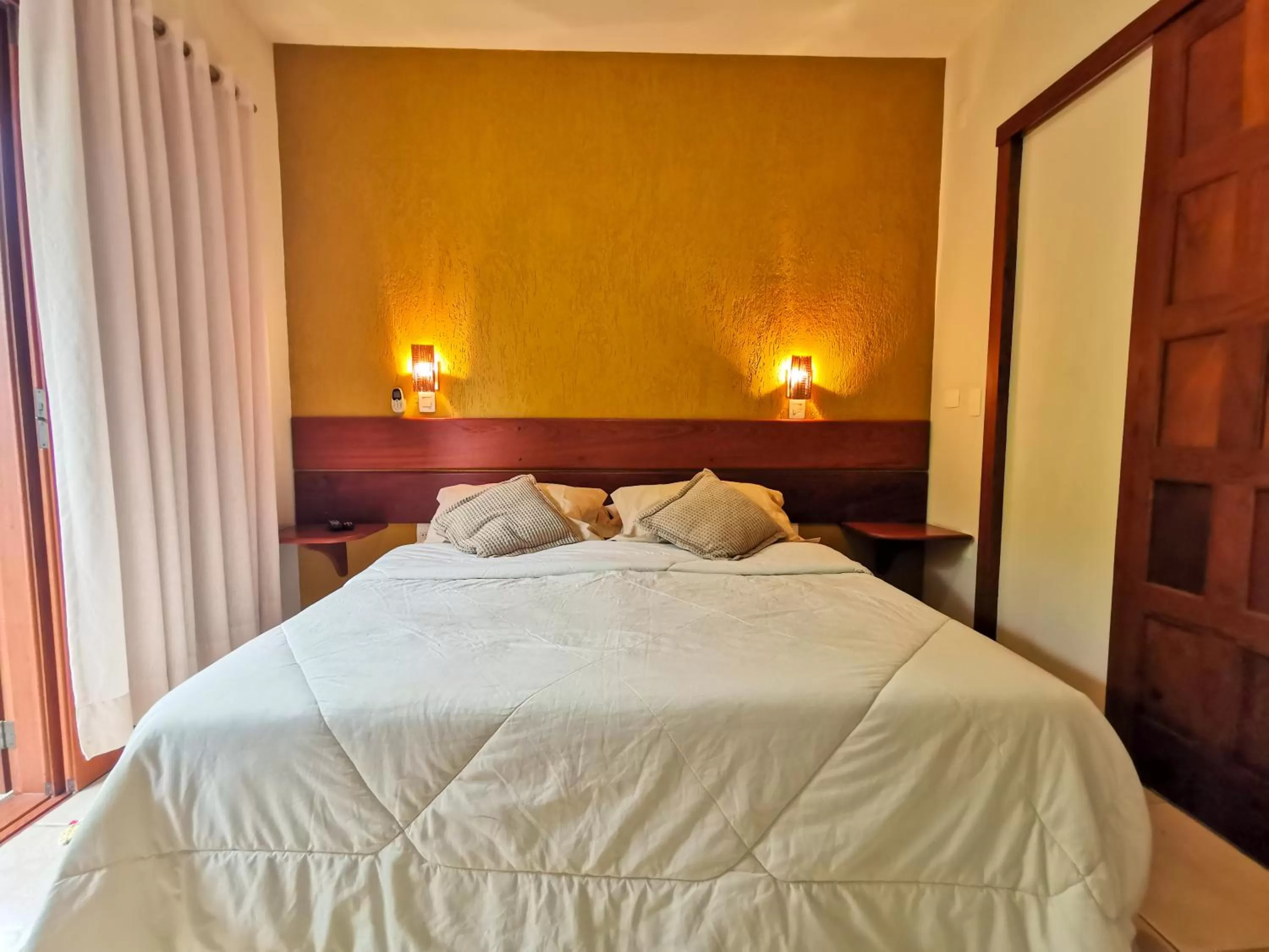 Bed in Pousada Ilha dos Anjos