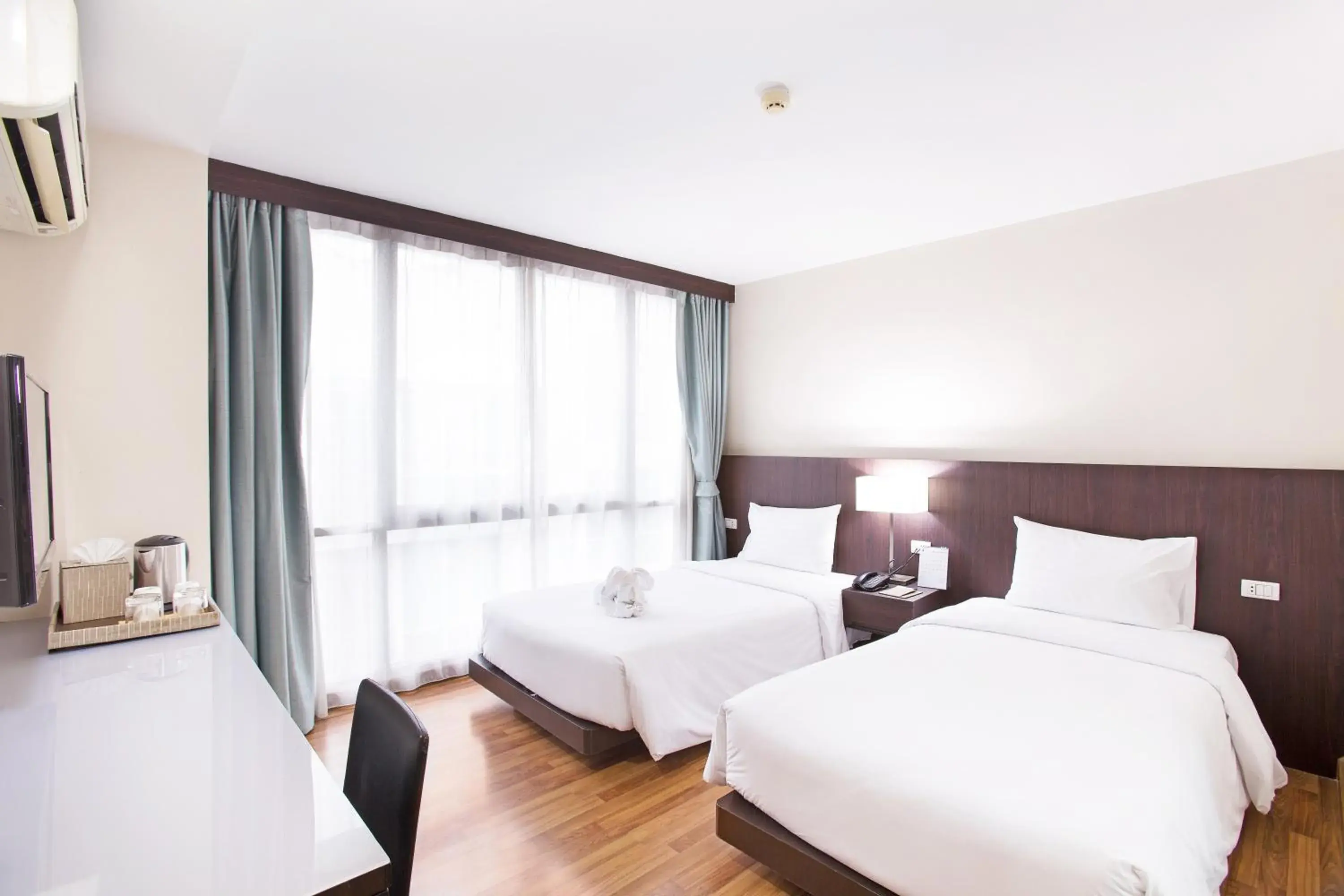 Bed in Mida Hotel Ngamwongwan - SHA Plus
