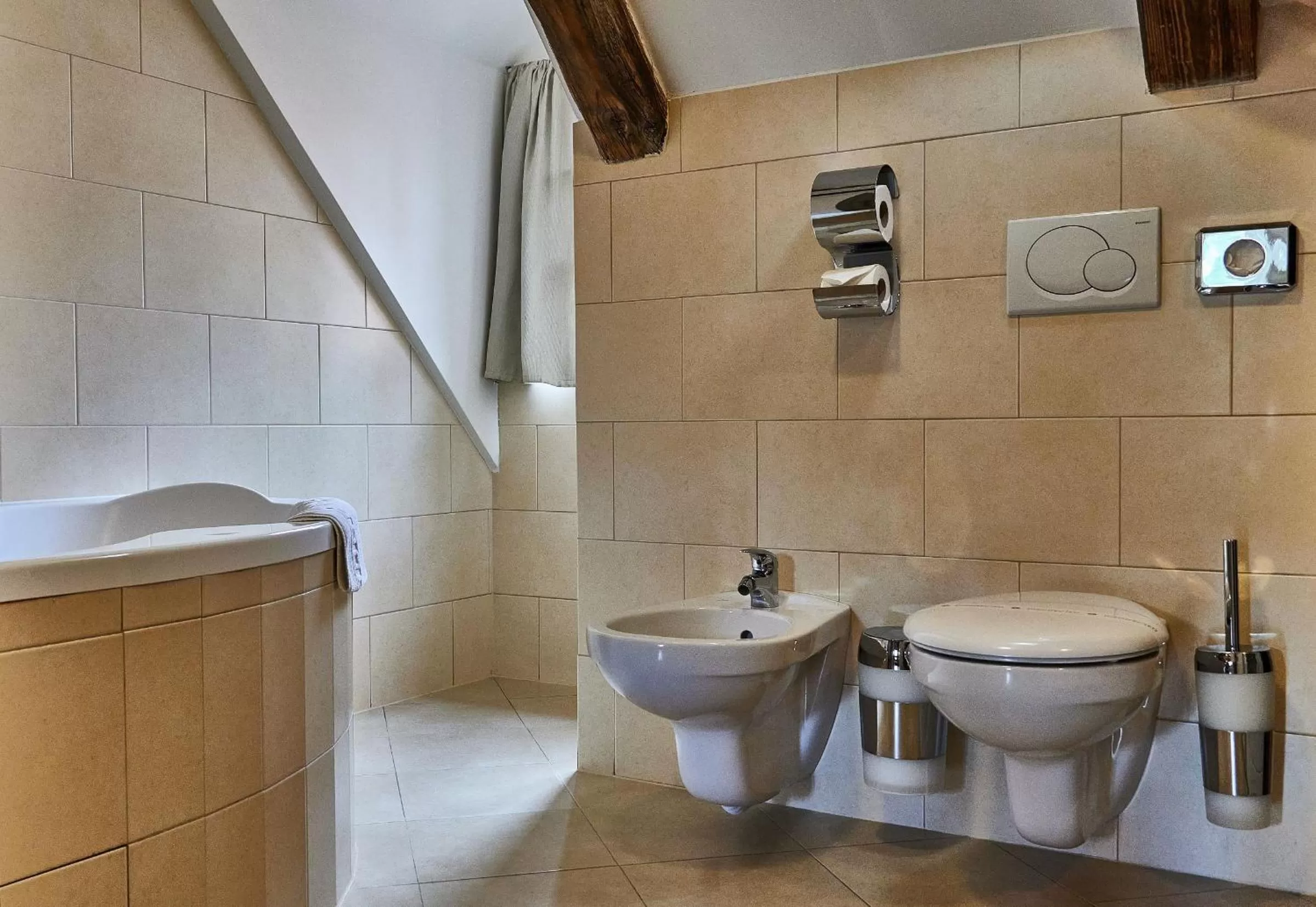 Toilet in Three Golden Crowns Apartments