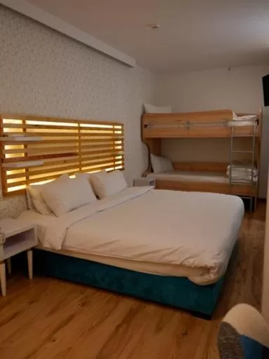 Bed in Athenian Montaza Hotel