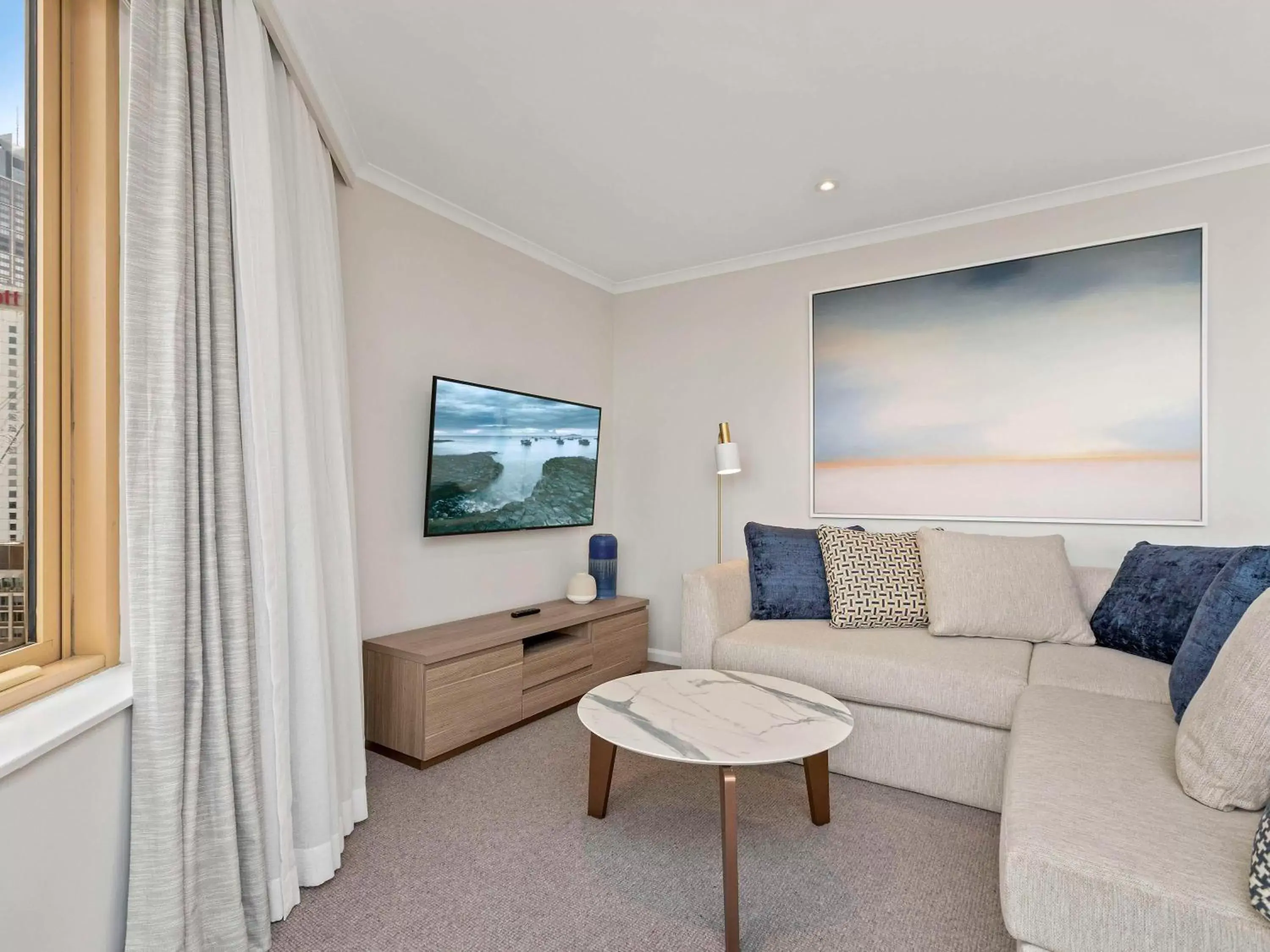 Bedroom, Seating Area in The Sebel Quay West Suites Sydney