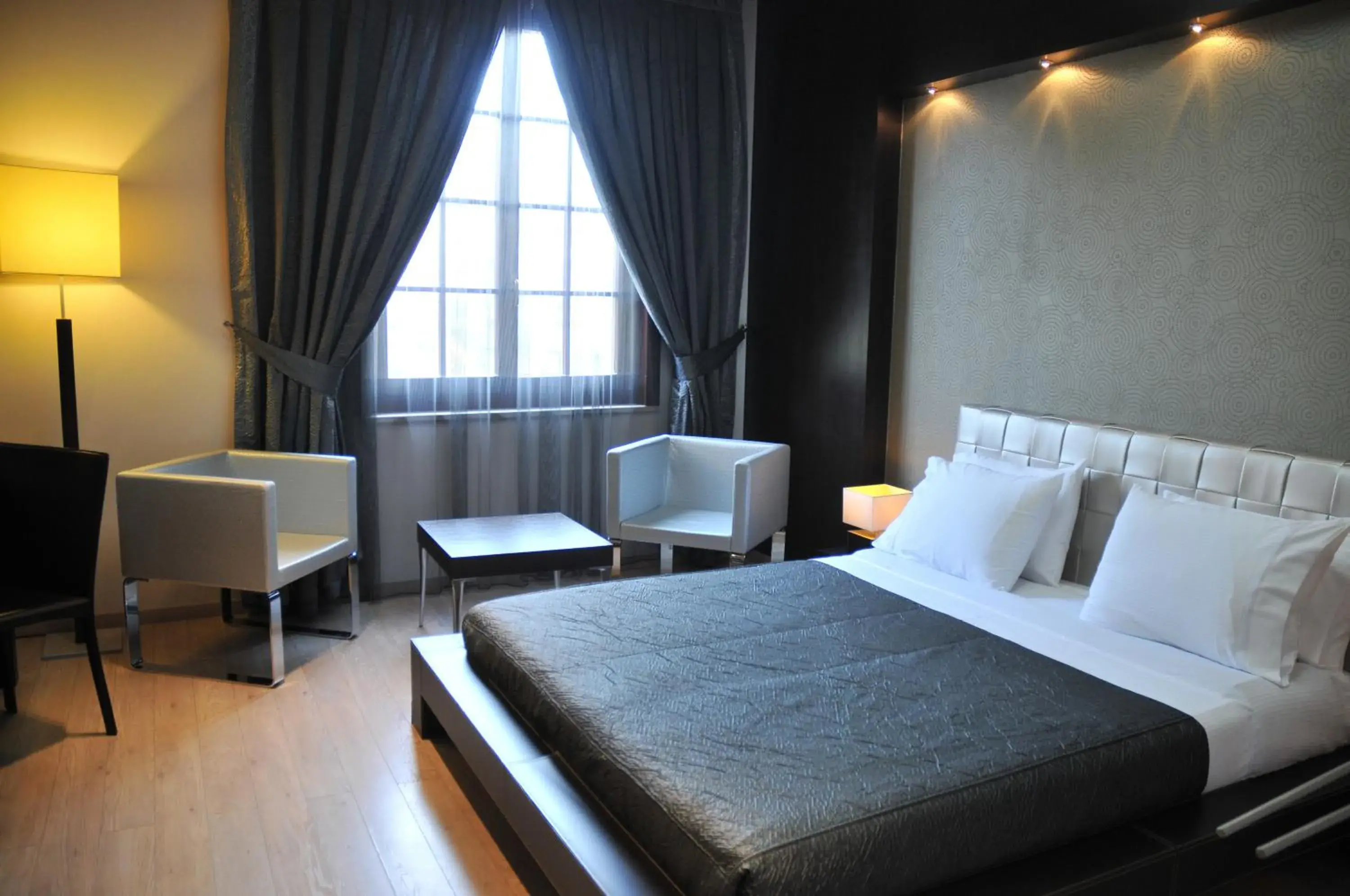 Bed in MonarC Hotel
