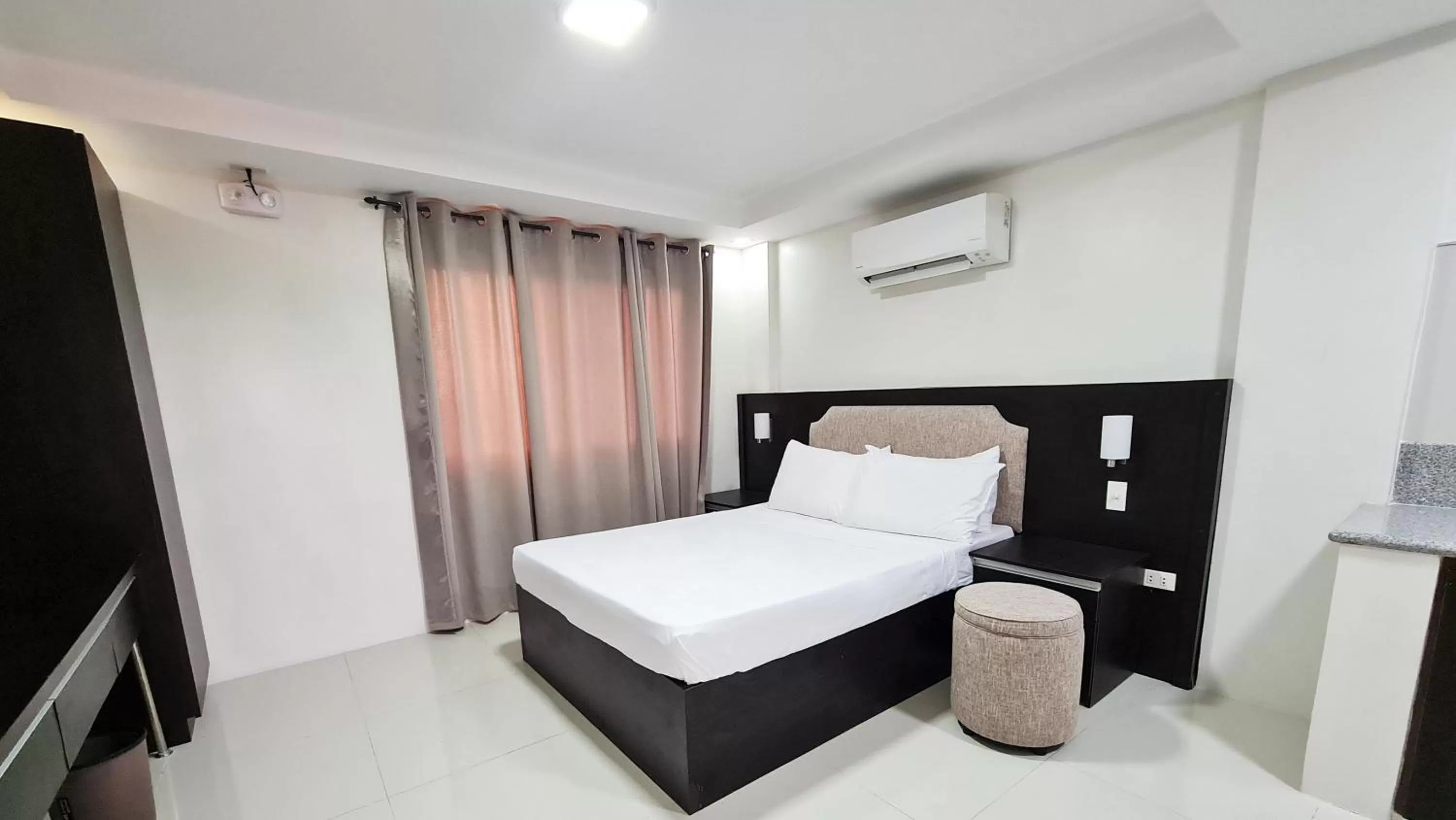 Bed in Staycation Hotel