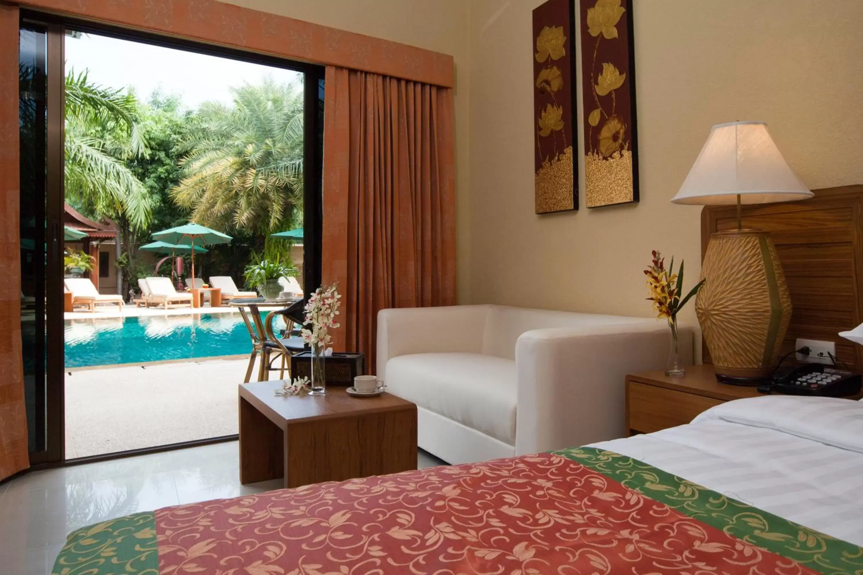 Living room, Pool View in Baan Souy Resort