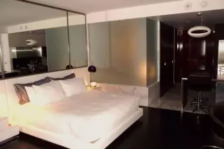Bed in Luxury Suites at Palms Place