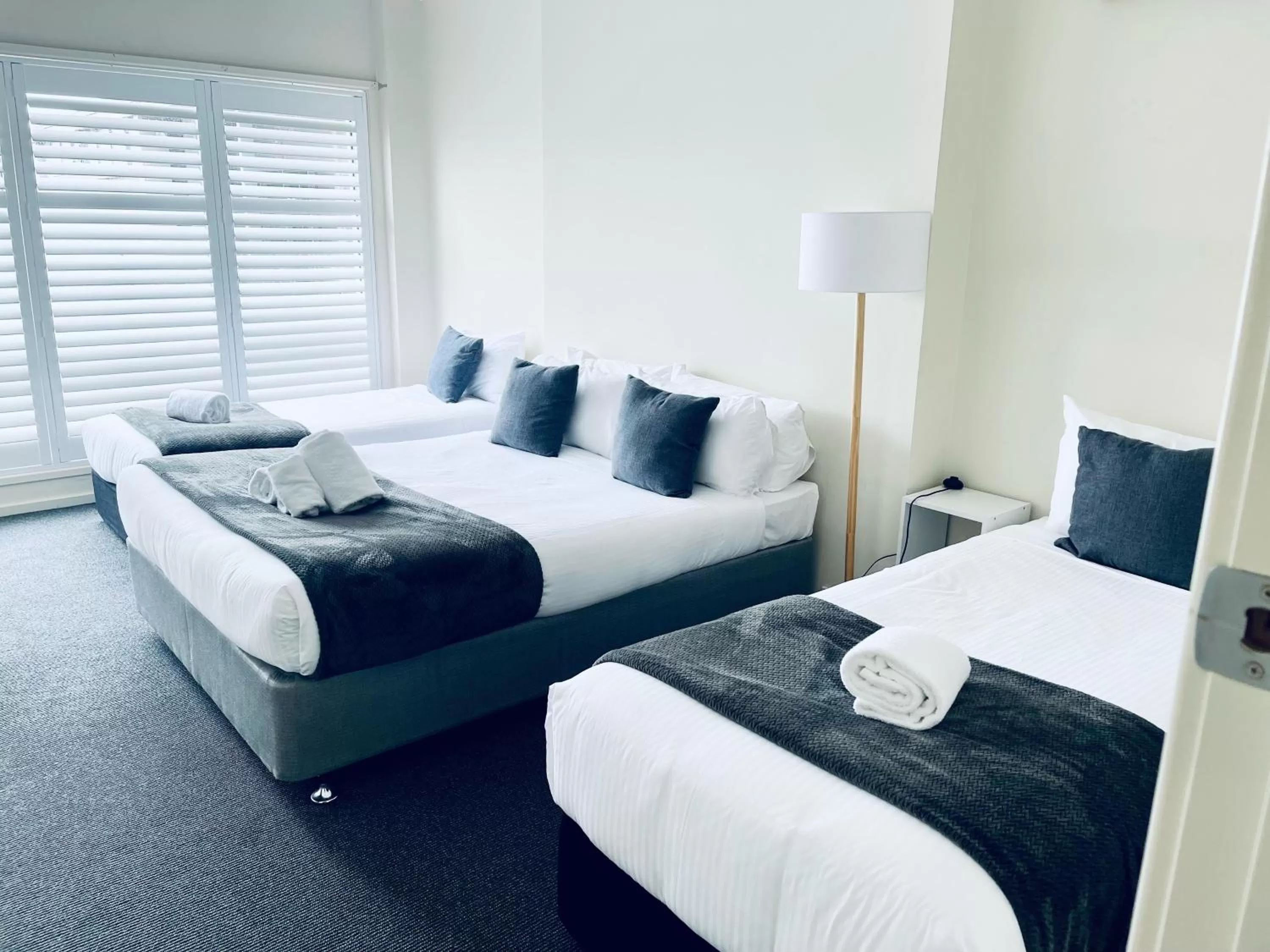 Bedroom, Bed in The Astor Hotel Motel