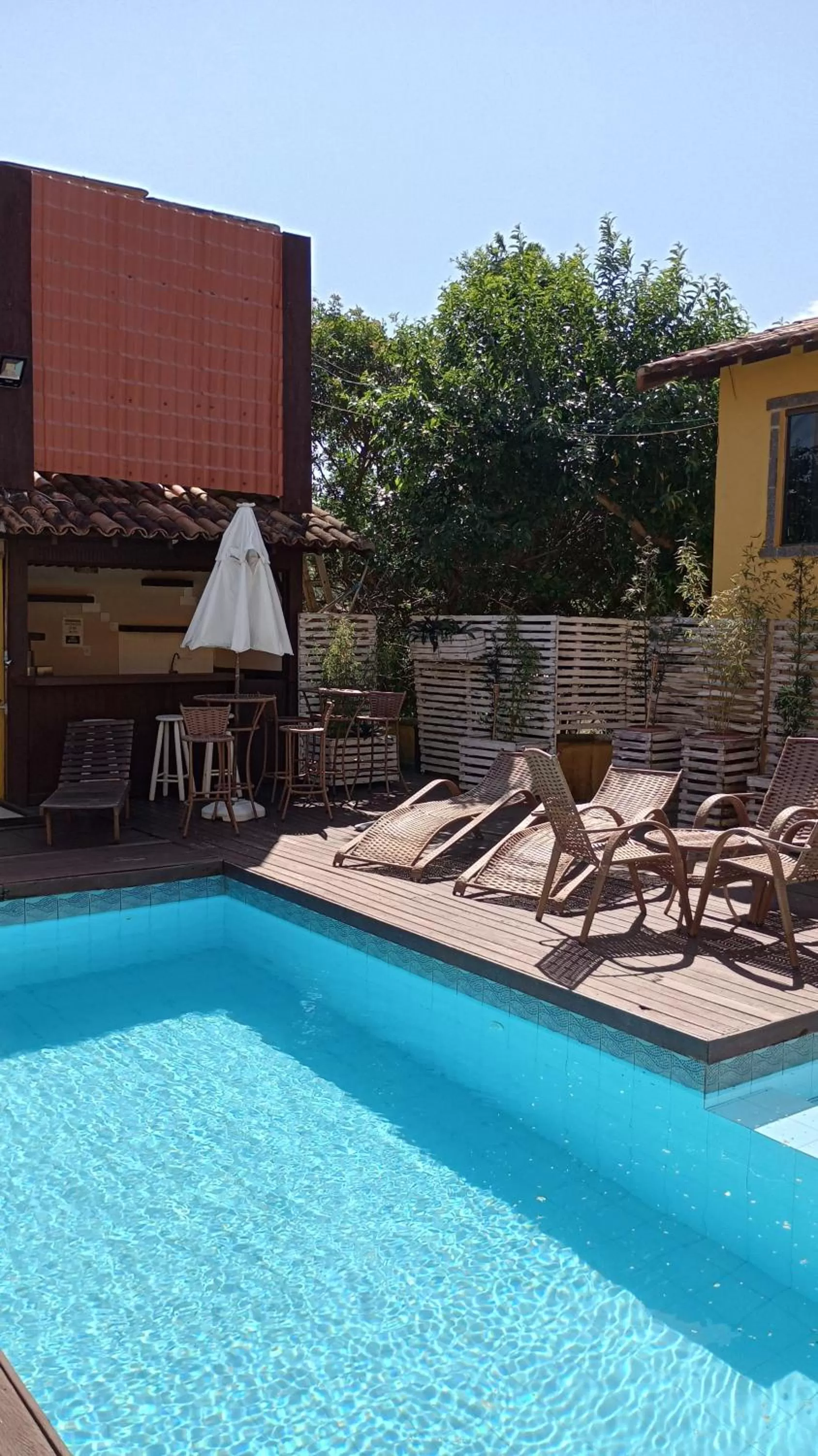 Patio, Swimming Pool in Hibiscos Pousada