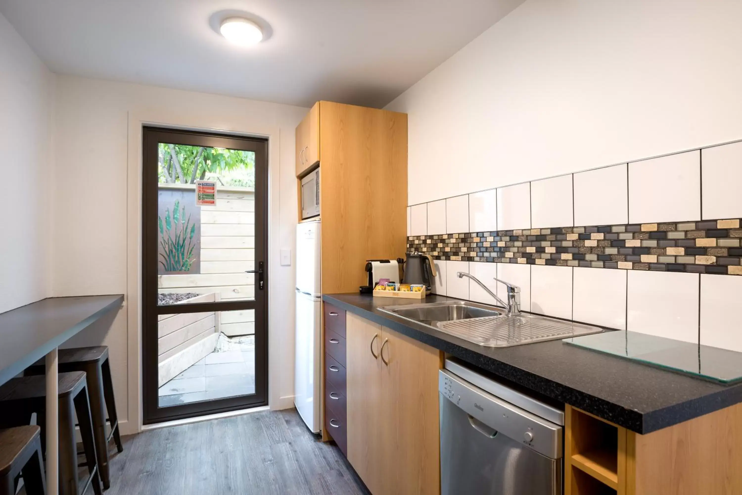 Kitchen or kitchenette, Kitchen/Kitchenette in Lomond Lodge Motel & Apartments