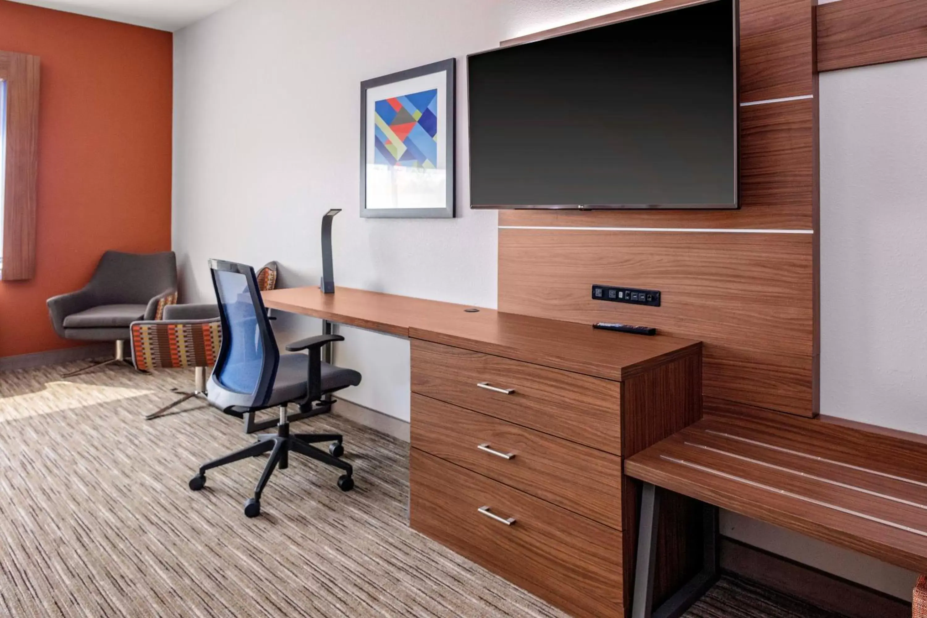 Photo of the whole room, TV/Entertainment Center in Holiday Inn Express & Suites - Madison, an IHG Hotel