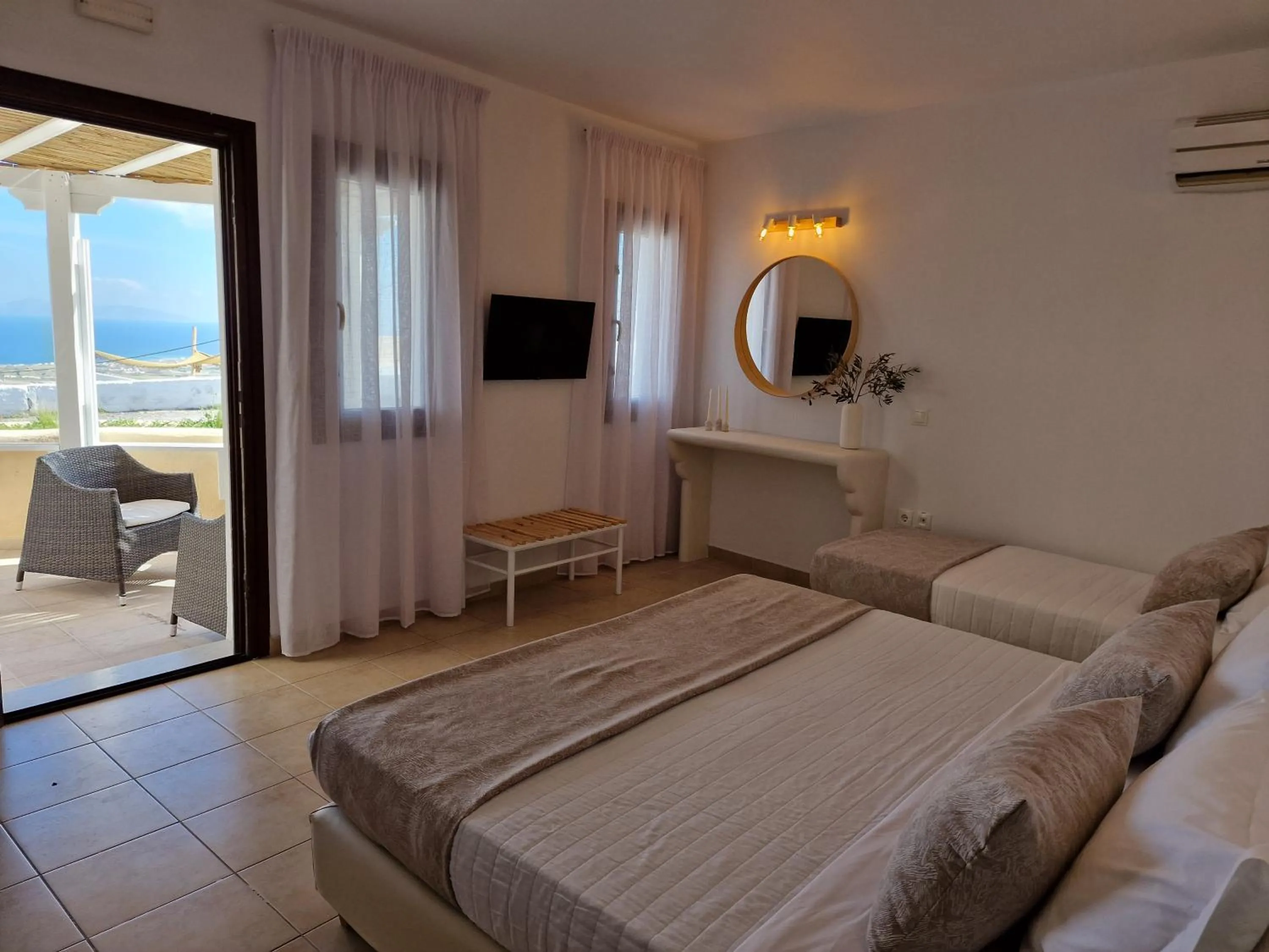 Bedroom in Amerisa Suites & Villa