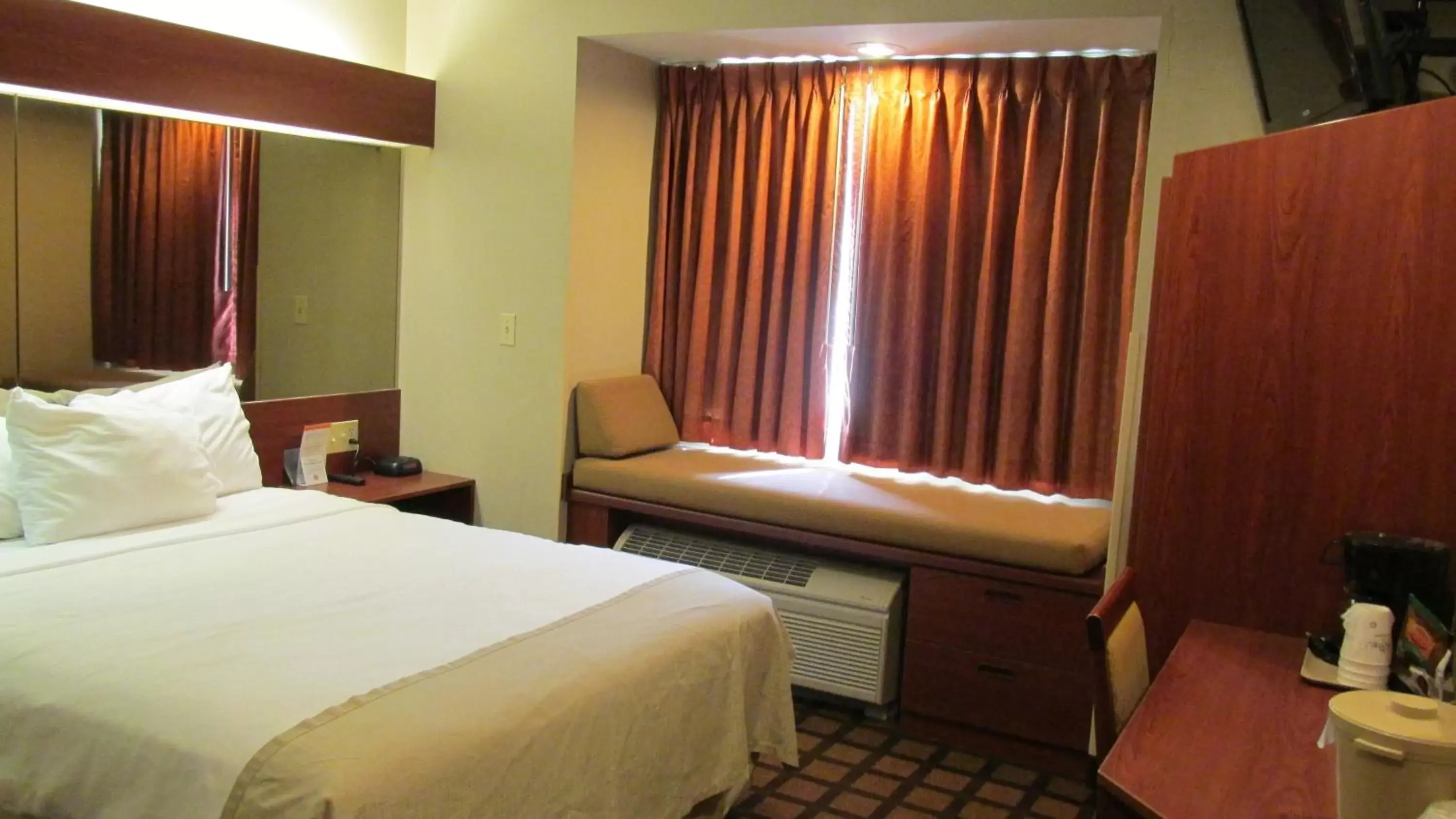 Bed in Microtel Inn & Suites by Wyndham Rapid City