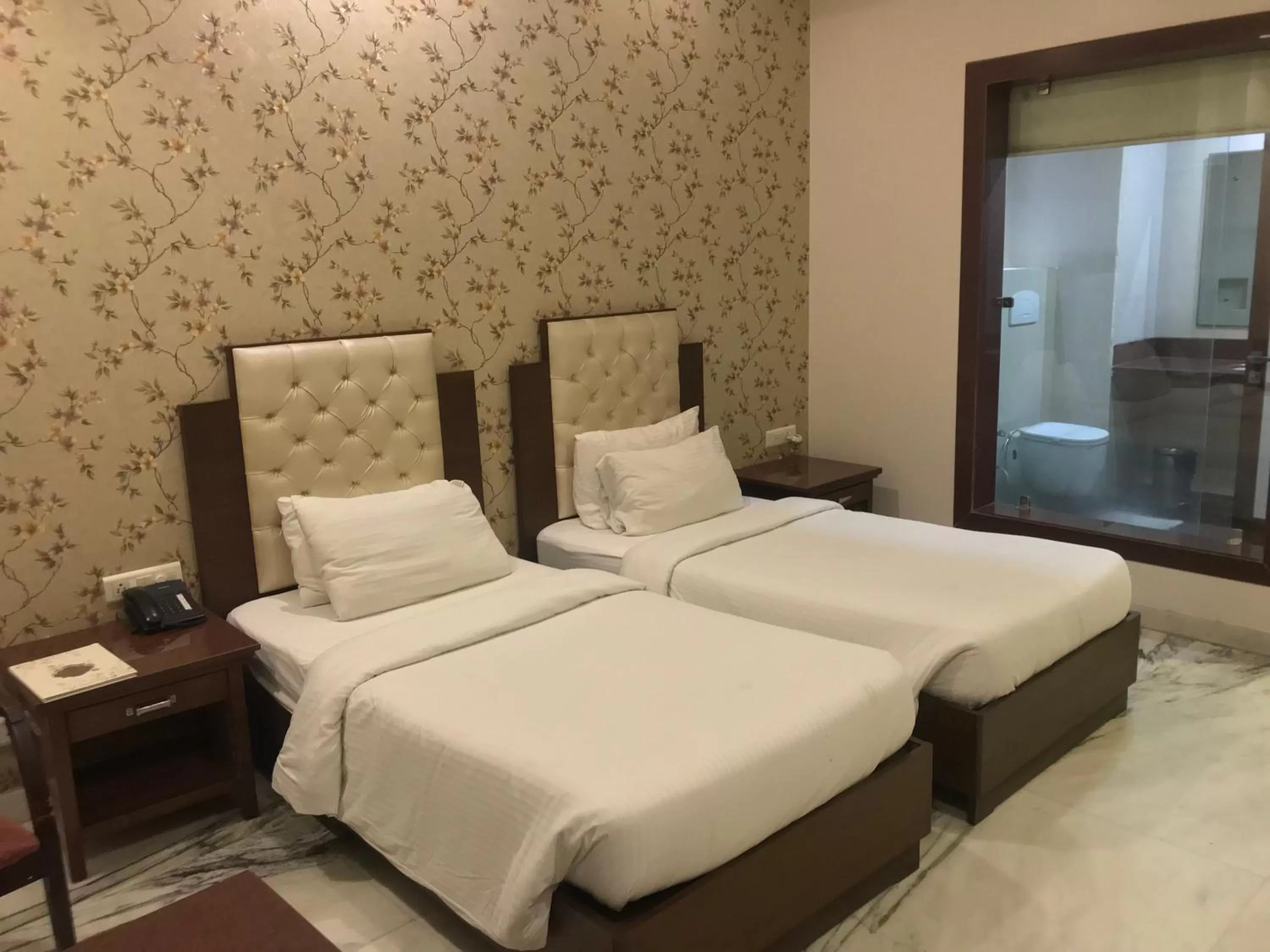 Bed in Hotel Leela Grande