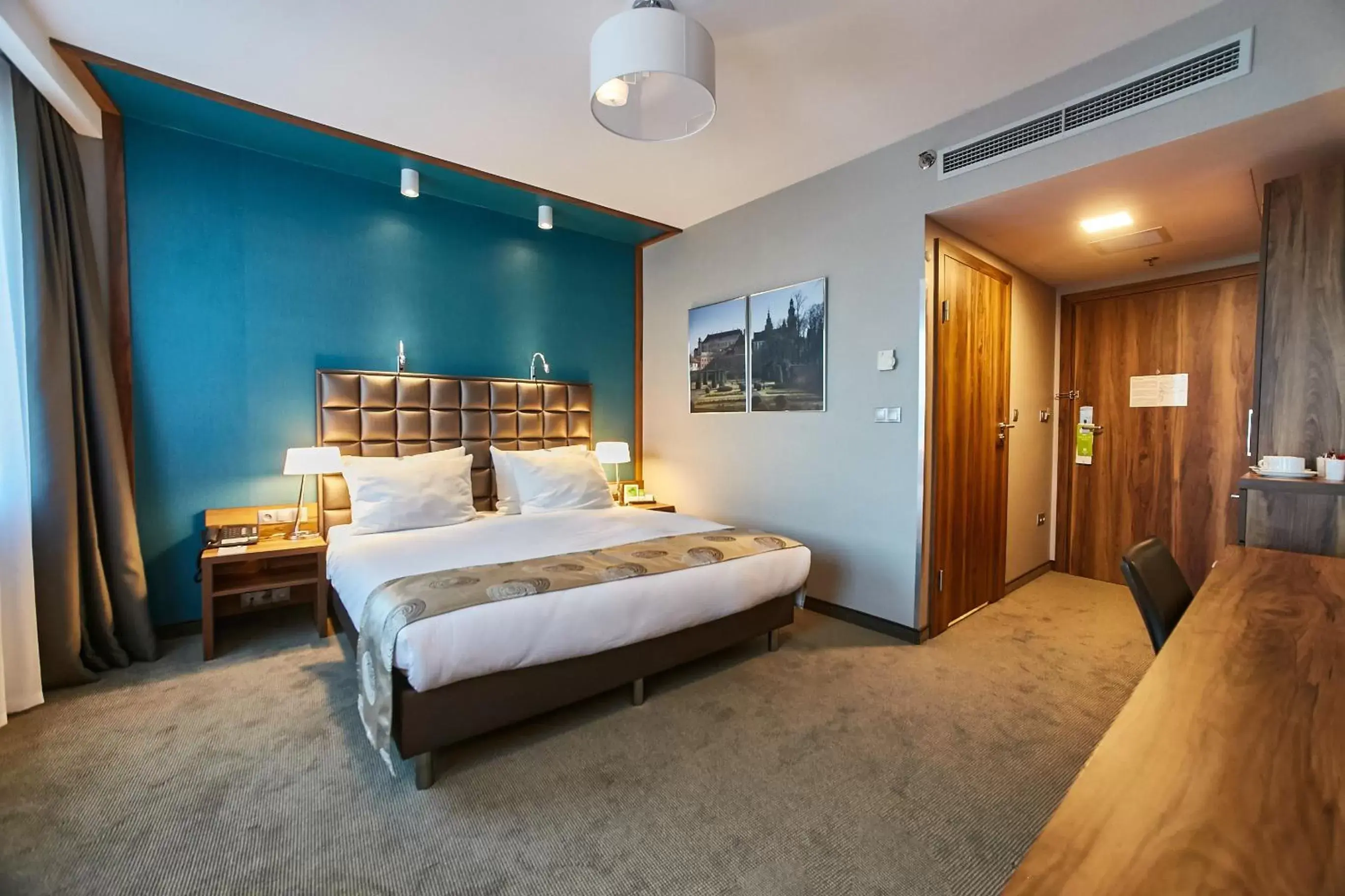 Bed in Holiday Inn Krakow City Centre, an IHG Hotel